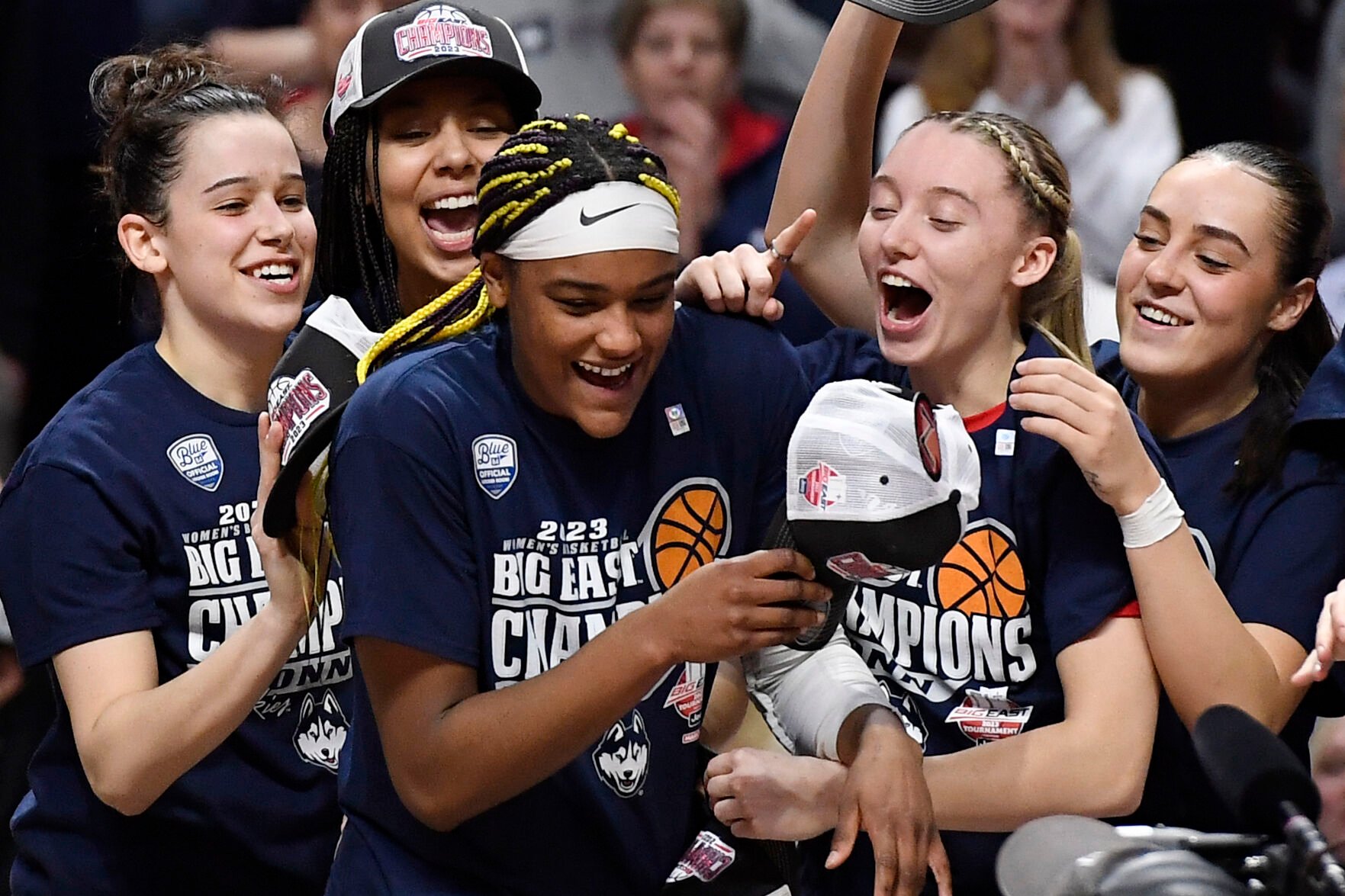 <p>UConn's Lou Lopez Senechal, left, Amari DeBerry, back left, Paige Bueckers, second from right, and Nika Muhl, right, surround Big East Tournament Most Outstanding Player Aaliyah Edwards, after their win in Big East Conference tournament championship game against Villanova, last Monday, at Mohegan Sun Arena in Uncasville, Conn.</p>