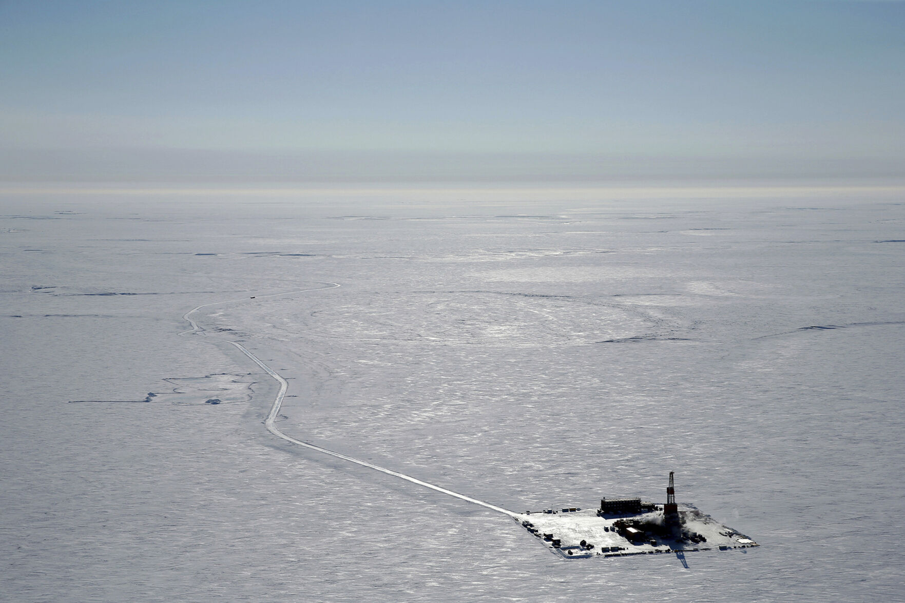 <p>This 2019 aerial photo provided by ConocoPhillips shows an exploratory drilling camp at the proposed site of the Willow oil project on Alaska's North Slope. </p>