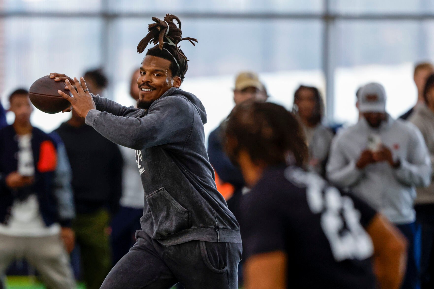 <p>Former NFL and Auburn quarterback, Cam Newton, throws a pass during Auburn Pro Day on Tuesday in Auburn, Ala.</p>