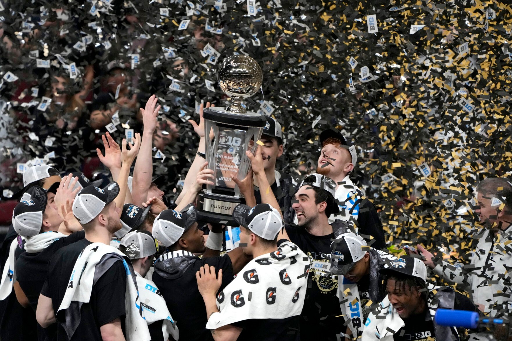 <p>The Purdue Boilermakers celebrate after beating Penn State in Sunday's Big Ten Tournament final in Chicago.</p>