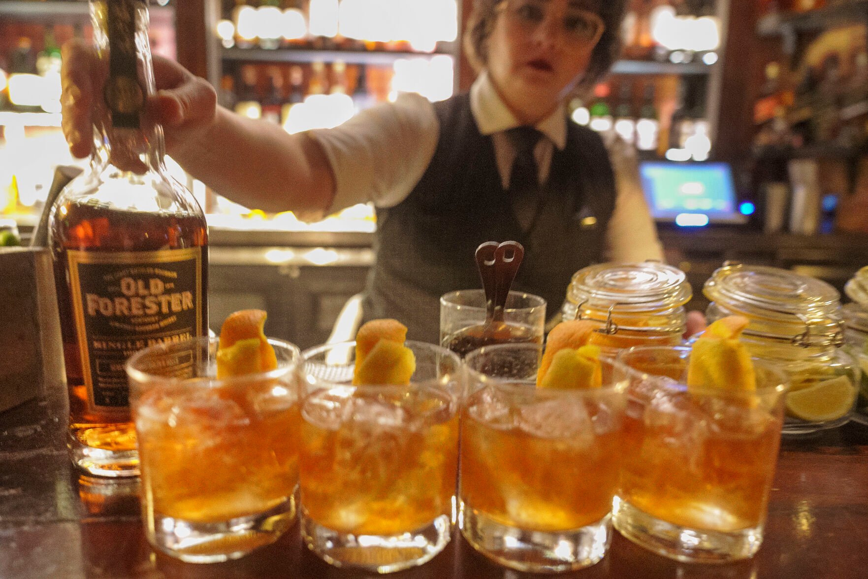 <p>Old Forester Straight Bourbon Whiskey is used to mix Old Fashioned cocktails March 4 at the Seven Grand bar, a whiskey bar in downtown Los Angeles.</p>