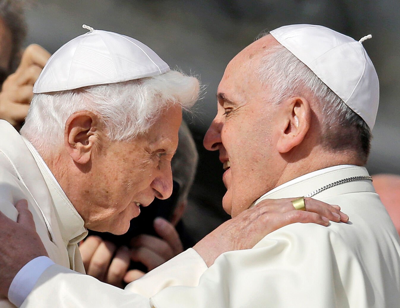 <p>Pope Francis, right, hugs Pope Emeritus Benedict XVI on Sept. 28, 2014, prior to the start of a meeting with elderly faithful in St. Peter's Square at the Vatican.</p>