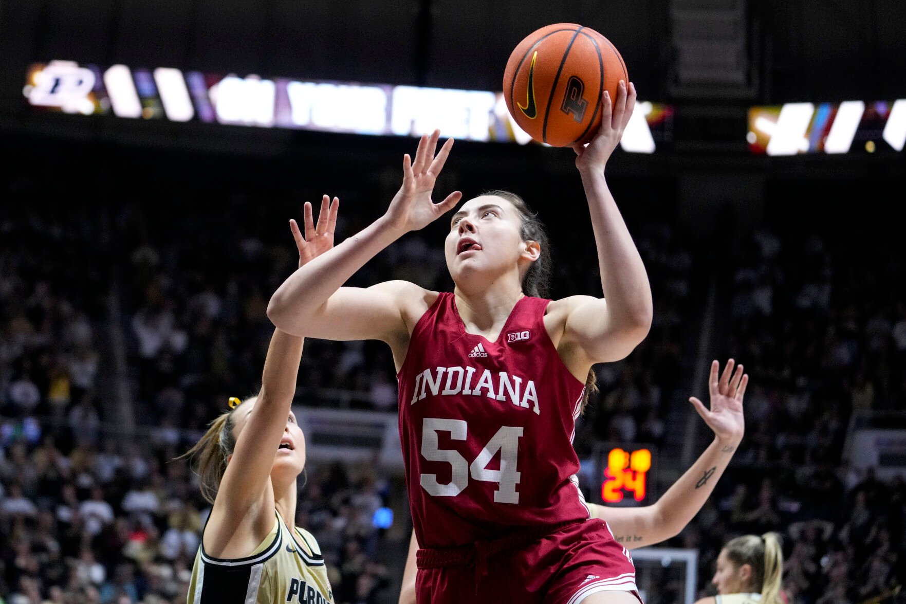 <p>Indiana forward Mackenzie Holmes shoots against Purdue on Feb. 5.</p>