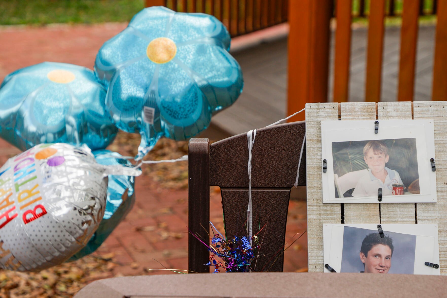 <p>Before walking to the wind phone, Laura McCullough set up a shrine near the gazebo for her son, Devon. He died years ago, at age 27. She still constantly thinks of things she wants to tell him. </p>