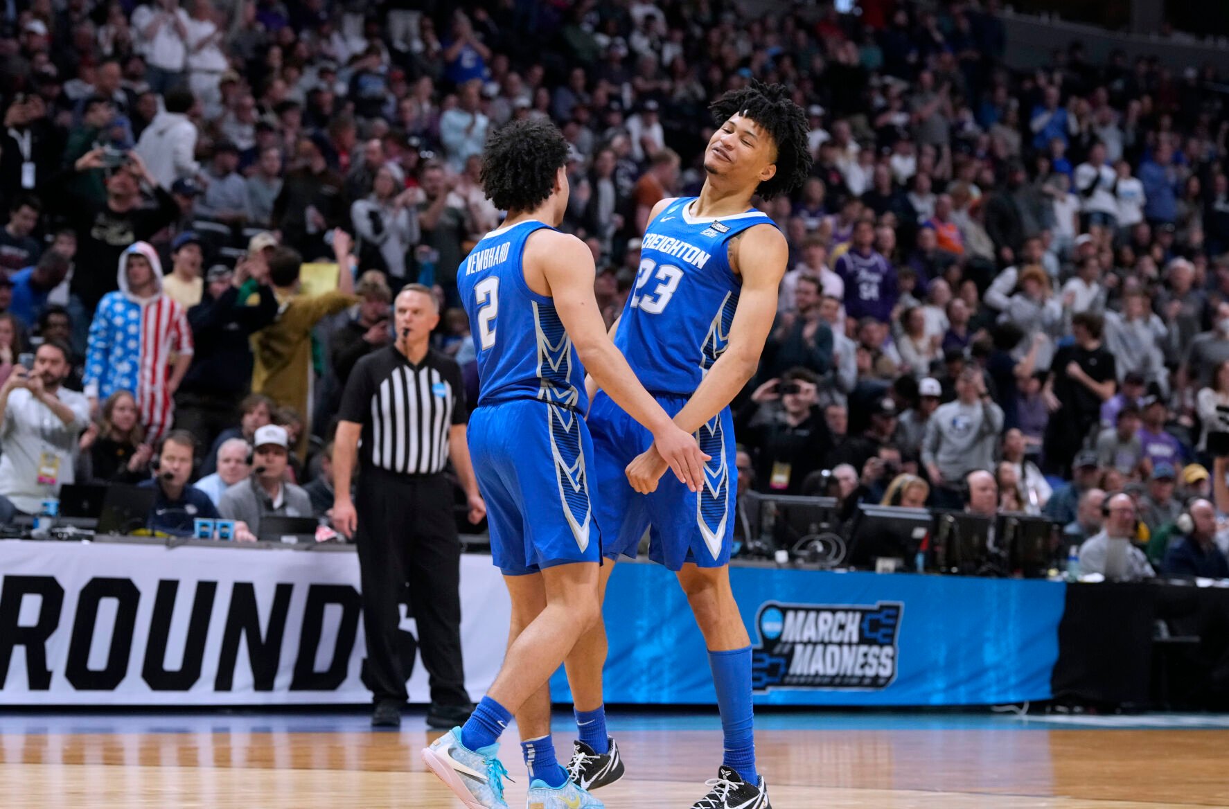 <p>Creighton guard Ryan Nembhard, left, celebrates with guard Trey Alexander near the end of a second-round NCAA Tournament game against Baylor on Sunday in Denver.</p>