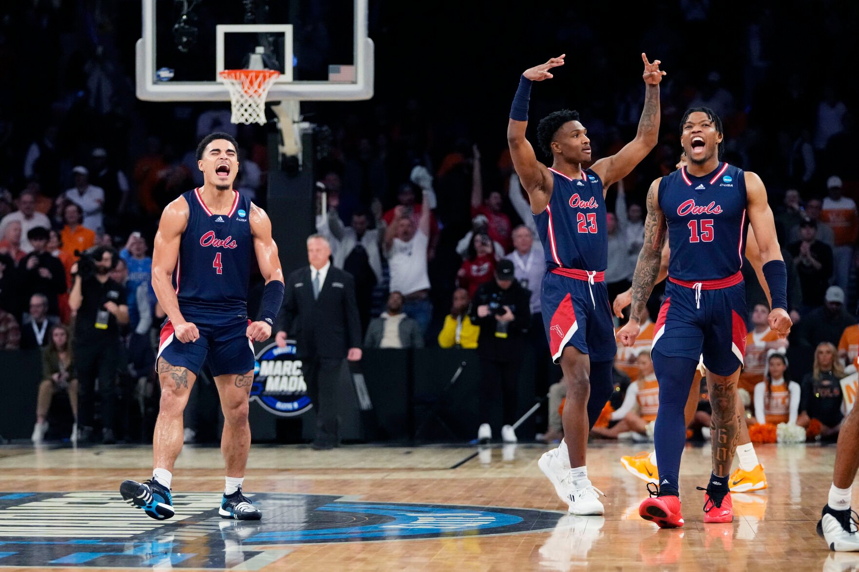 <p>Florida Atlantic guards Bryan Greenlee, left, Brandon Weatherspoon, center, and Alijah Martin react after the team defeated Tennessee in the Sweet 16 on Thursday at Madison Square Garden in New York.</p>