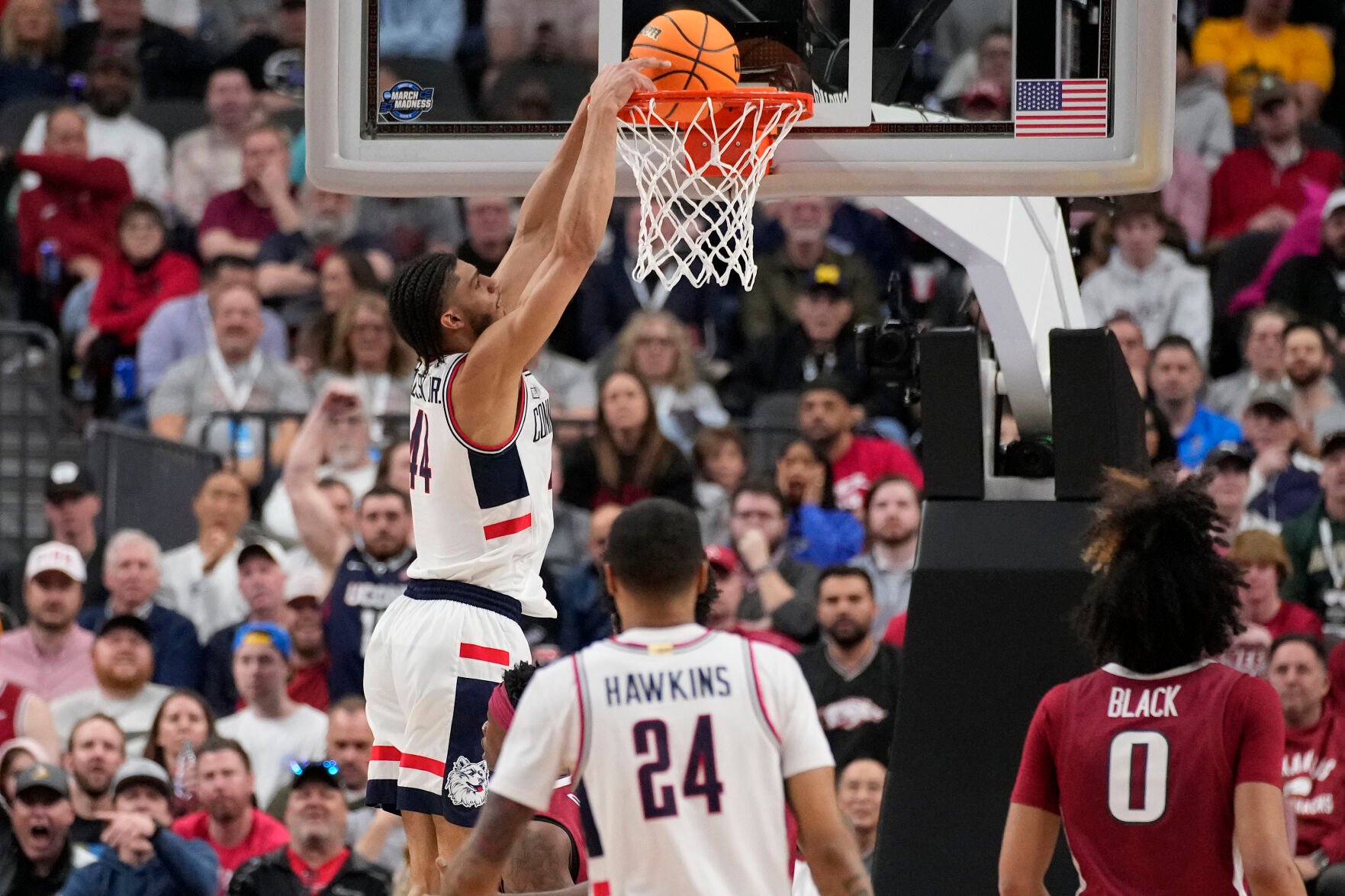 <p>UConn's Andre Jackson Jr. dunks in the first half of a Sweet 16 game against against Arkansas on Thursday in Las Vegas. (AP Photo/John Locher)</p>