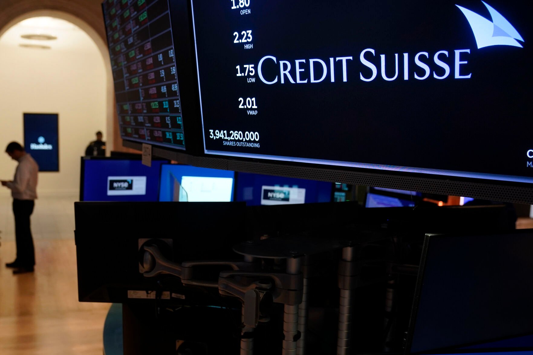 <p>A sign displays the name of Credit Suisse on the floor at the New York Stock Exchange on March 15 in New York.</p>