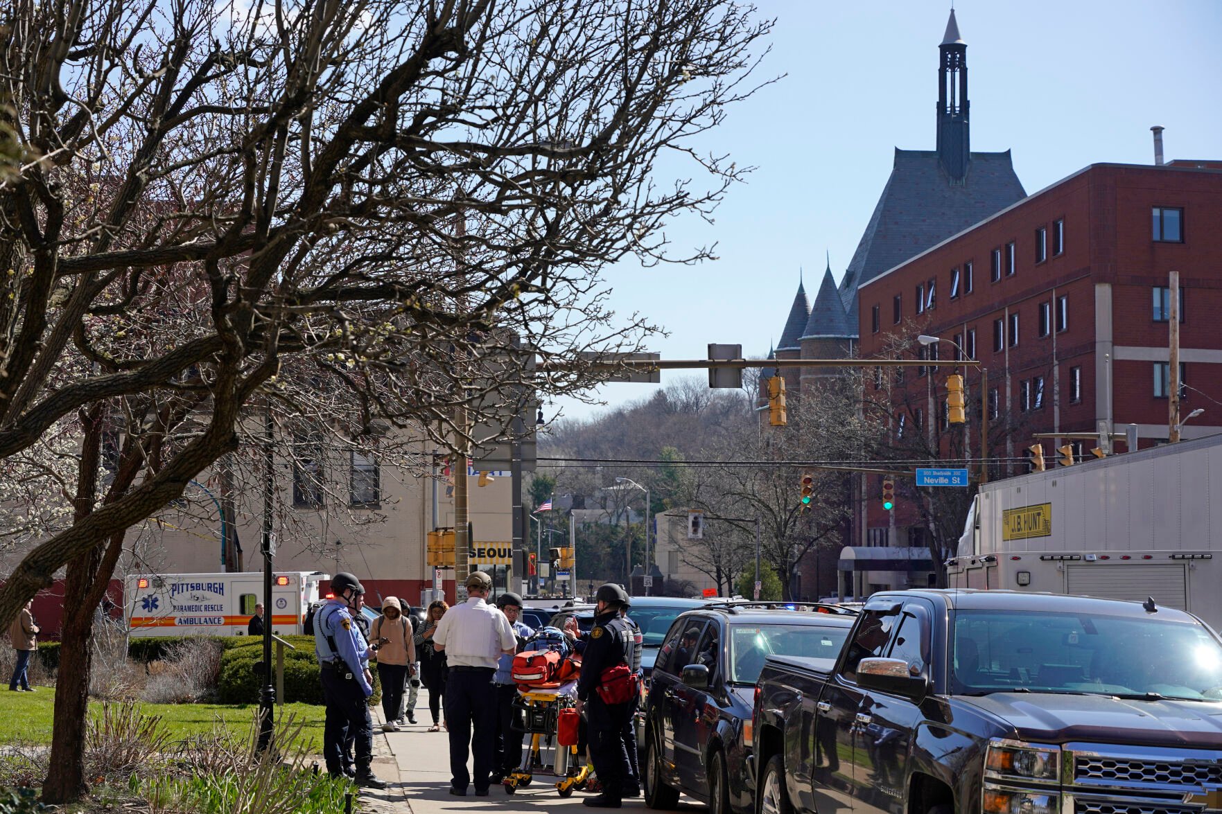 <p>Pittsburgh Police and paramedics respond to Pittsburgh Central Catholic High School for what turned out to be a hoax report of an active shooter, on Wednesday, March 29, 2023 in the Oakland neighborhood of Pittsburgh. (AP Photo/Gene J. Puskar)</p>