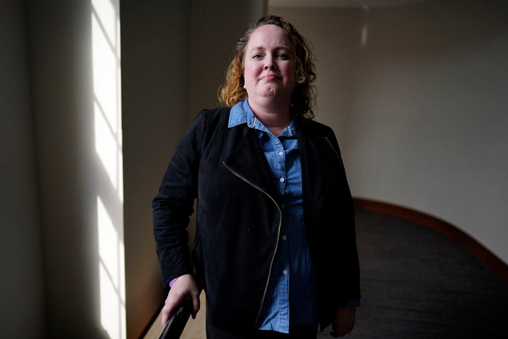 <p>Sara Hayden Parris, member of Annie's Foundation, which opposes efforts to remove books from school libraries, poses for a portrait, Thursday, March 2, 2023, in Ames, Iowa. </p>