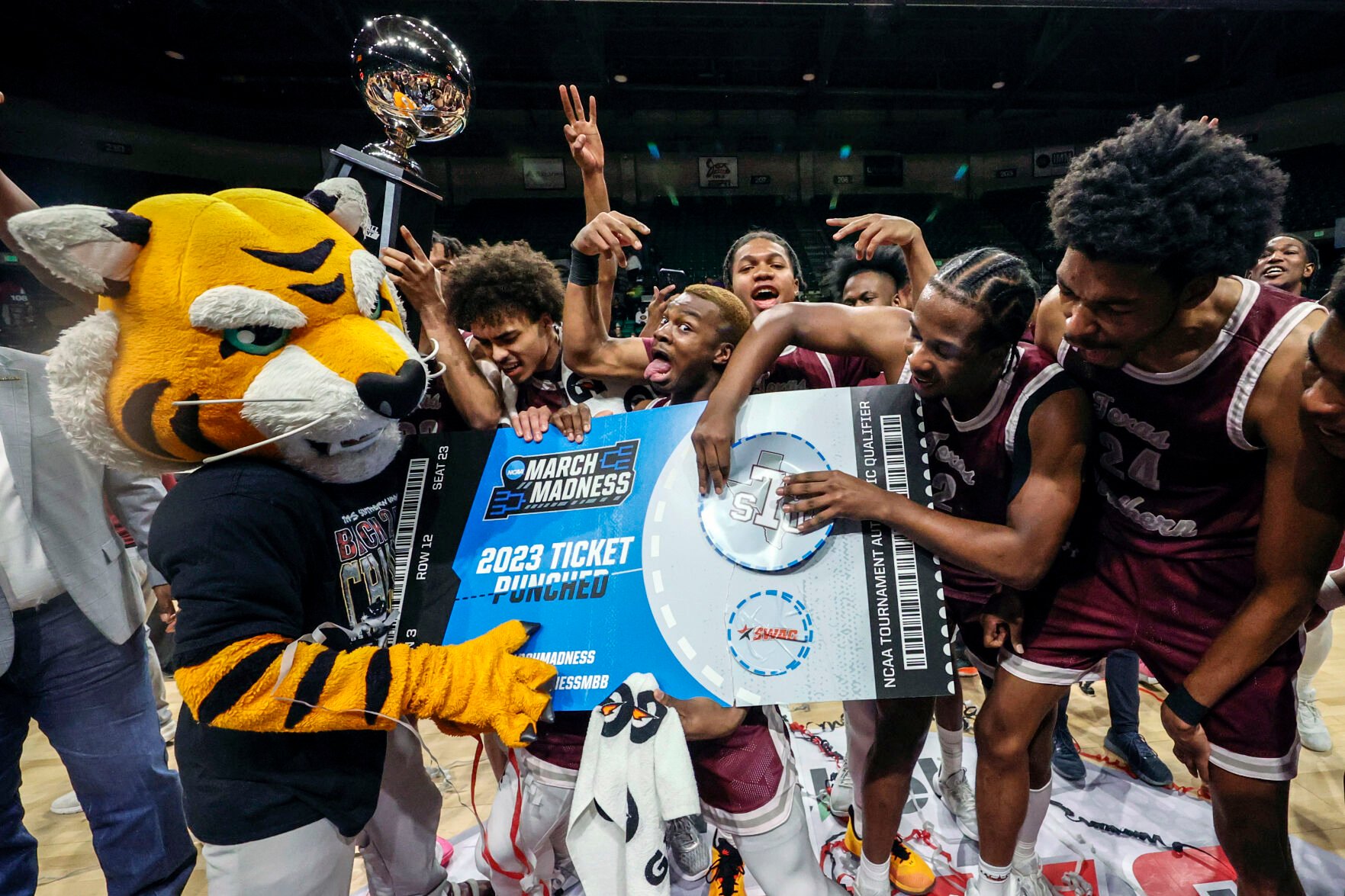 <p>Texas Southern players punch their ticket to March Madness by defeating Grambling State in Saturday's championship game of the Southwestern Athletic Conference tournament in Birmingham, Ala.</p>