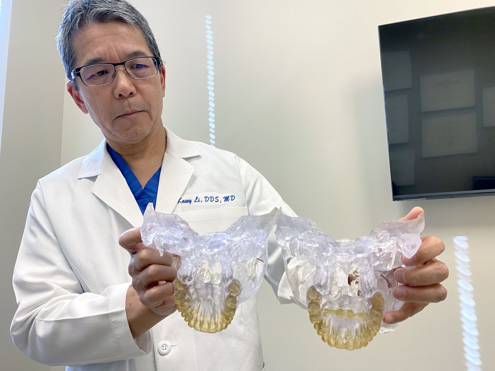 <p>Dr. Kasey Li, a California maxillofacial surgeon, who has examined about 10 patients fitted with the AGGA and reviewed dental scans of five more, describes it as a “medieval” device. Li says his experience with the AGGA patients he has examined is that “it does nothing but basically make them lose their teeth.” (Anna Werner/CBS News)</p>