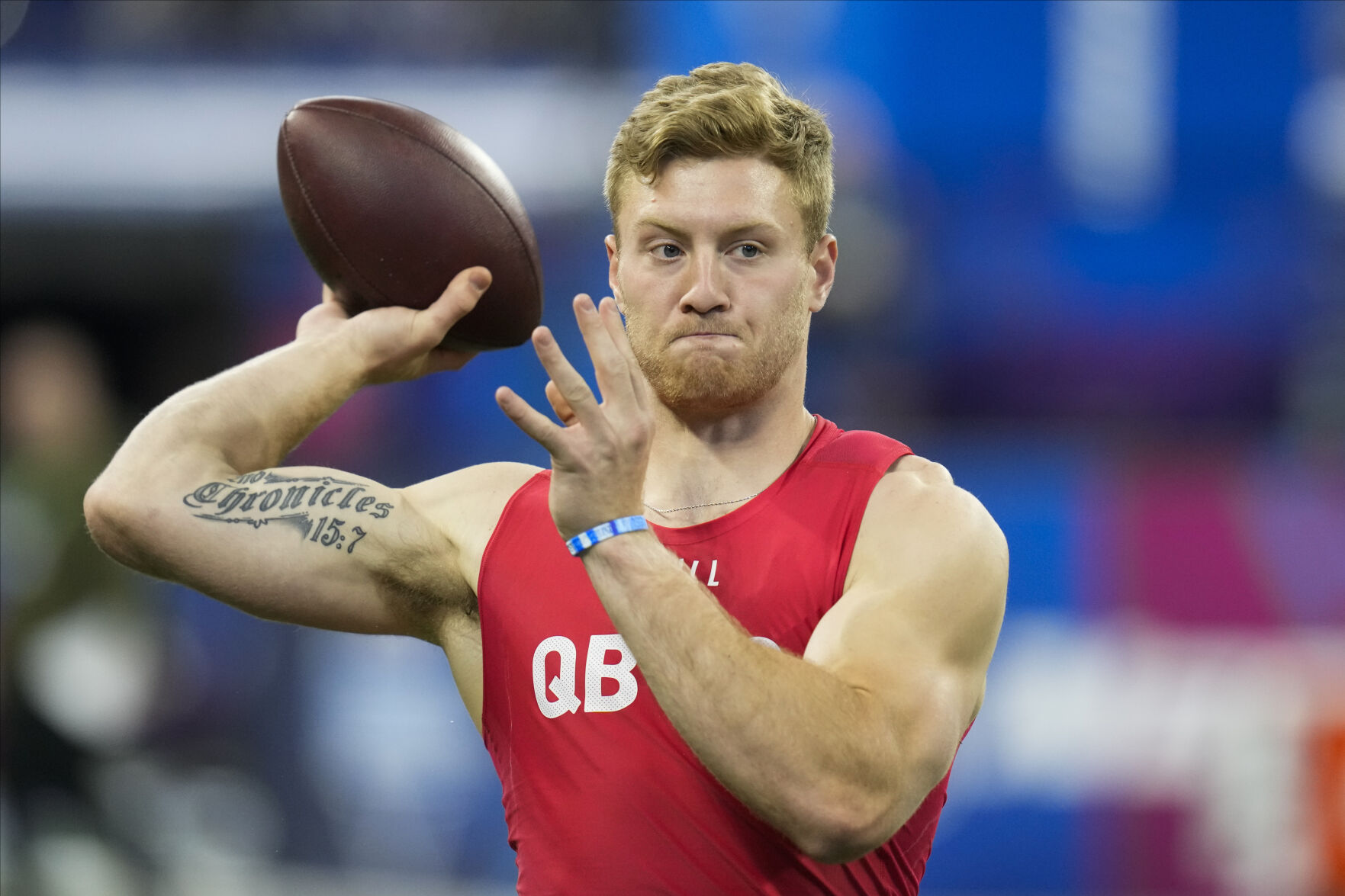 <p>Kentucky quarterback Will Levis warms up before he runs a drill at the NFL scouting combine on March 4 in Indianapolis.</p>