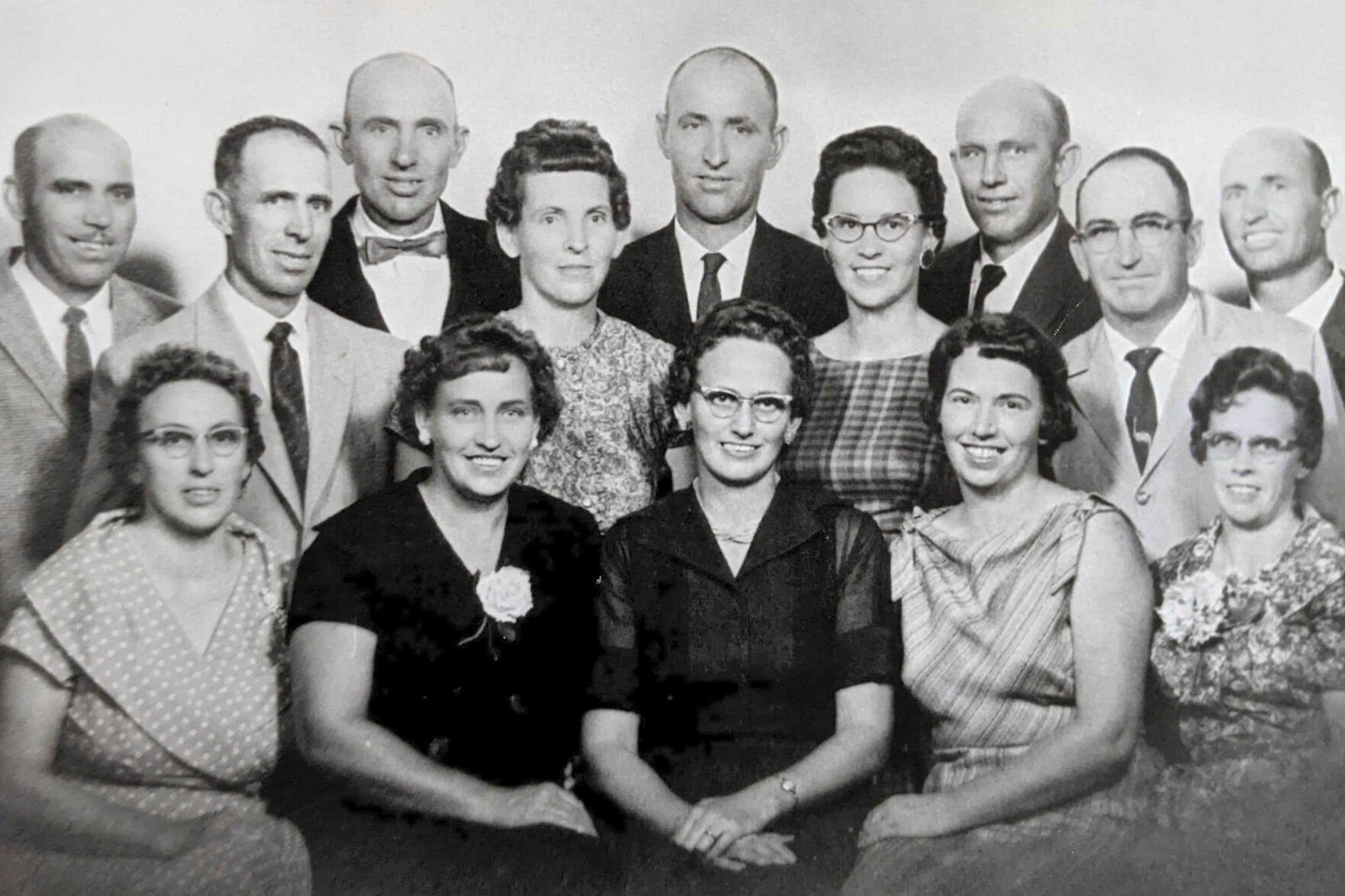 <p>Doug Whitney's mother, Mildred Reiswig Whitney, back row fourth from left, stands with her siblings during a family reunion in 1959. Doug Whitney’s grandparents had 14 children and 10 of them developed early-onset Alzheimer’s, including his mother.</p>