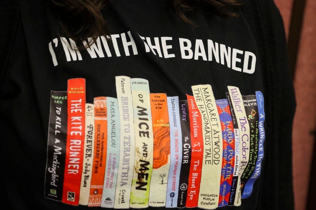 <p>Jennifer Wilson, a Largo High School English teacher, wears a shirt against banning books at the Pinellas County School Board meeting in Largo, Fla., Feb. 14, 2023. </p>