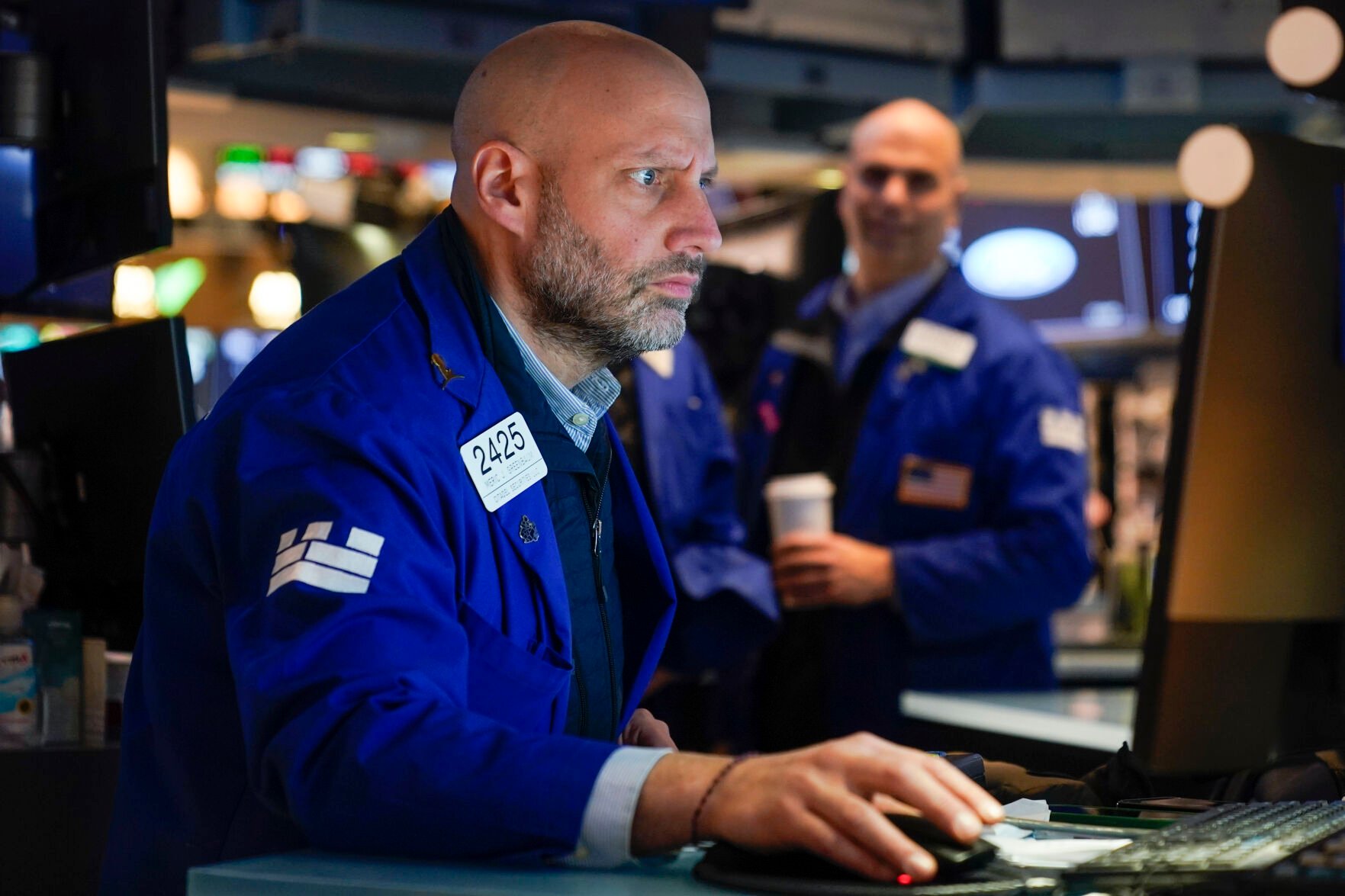 <p>Traders work on the floor at the New York Stock Exchange on Wednesday in New York.</p>
