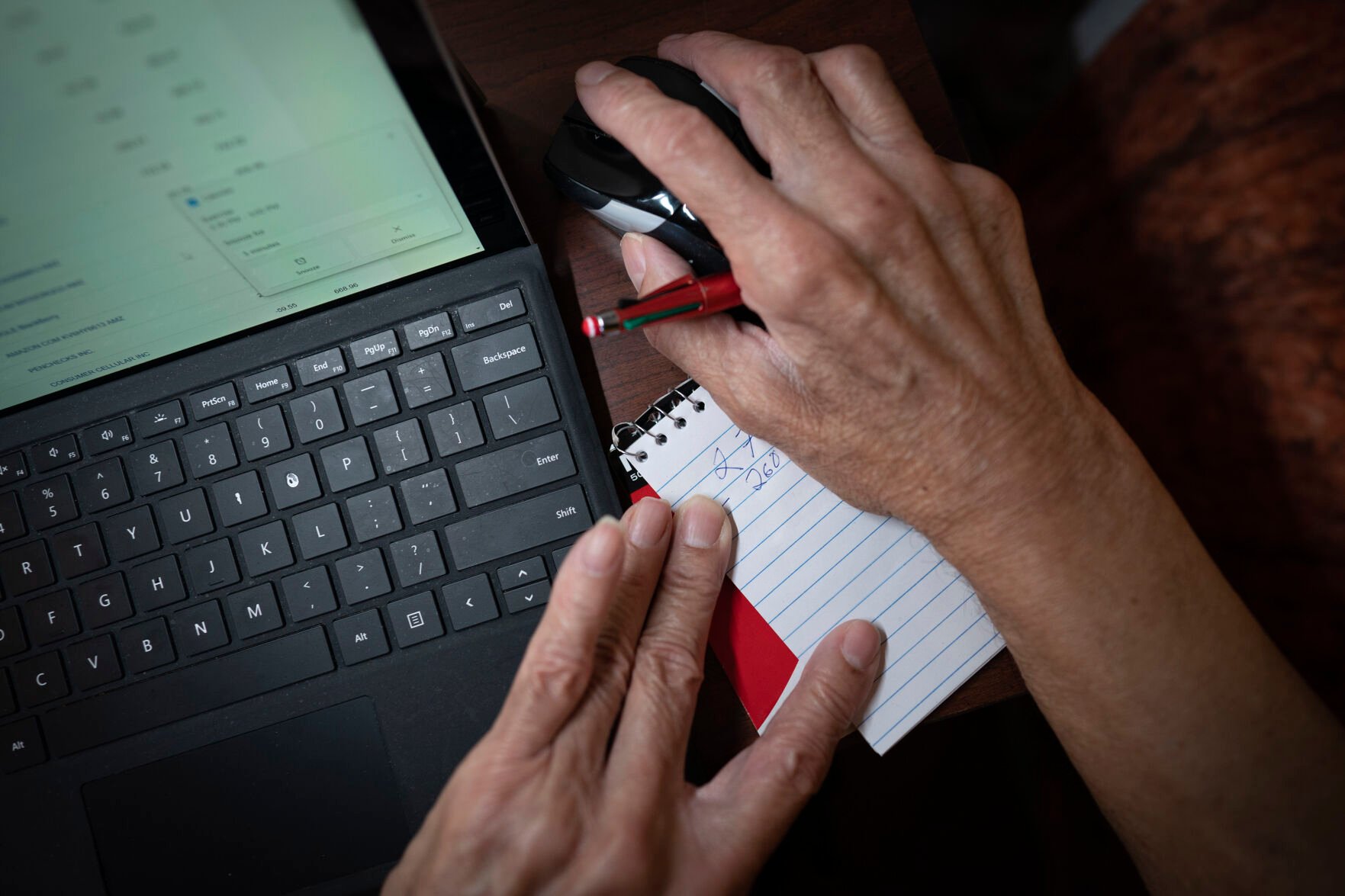 <p>Alex Morisey calculates his finances and how much he would have left if he were to buy himself a pair of pants Feb. 15 at a nursing home in Philadelphia. Hundreds of thousands of nursing home residents in the U.S. rely on Medicaid's personal needs allowance as their only source of income. </p>