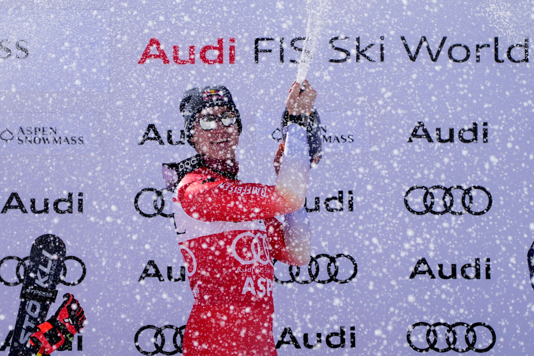 <p>Switzerland's Marco Odermatt celebrates a first place finish in a men's World Cup super-G skiing race on Sunday in Aspen, Colo.</p>