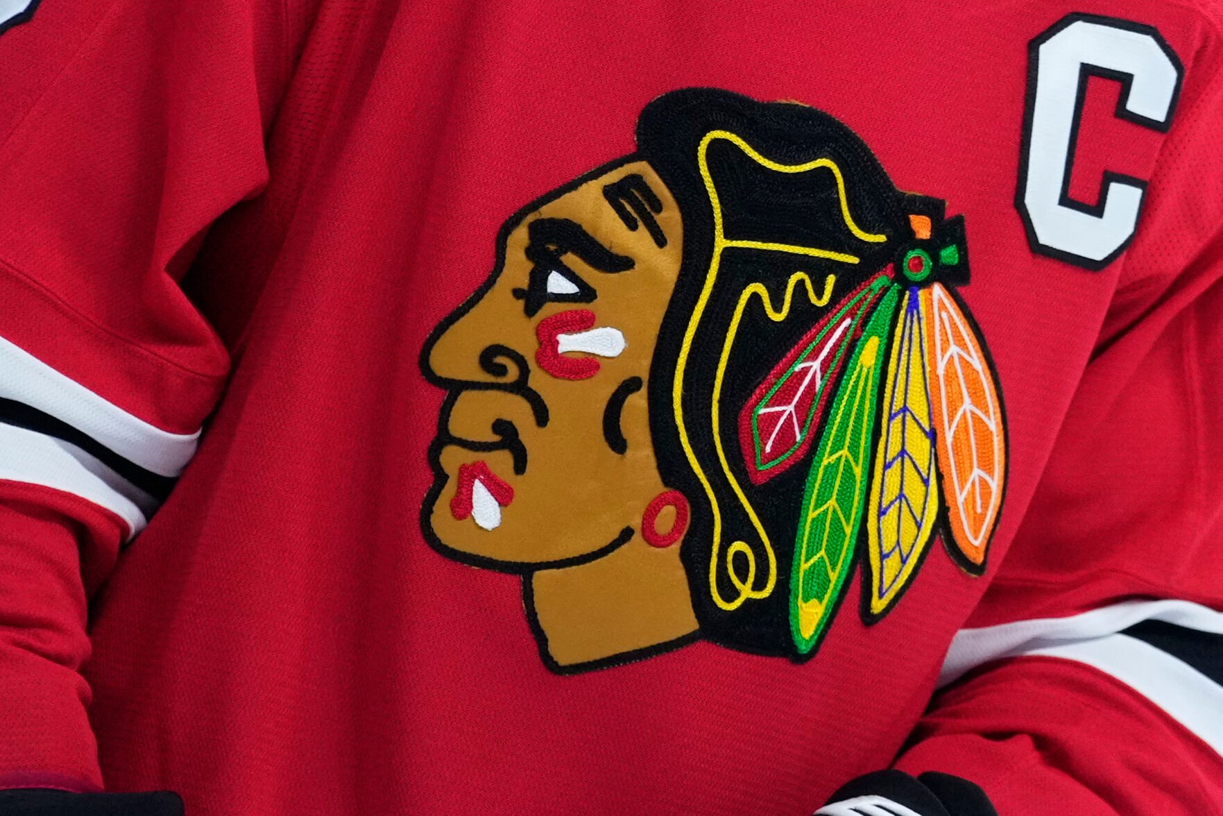 <p>FILE - The Chicago Blackhawks' logo is seen during an NHL hockey game on Jan. 19, 2023, in Philadelphia. </p>