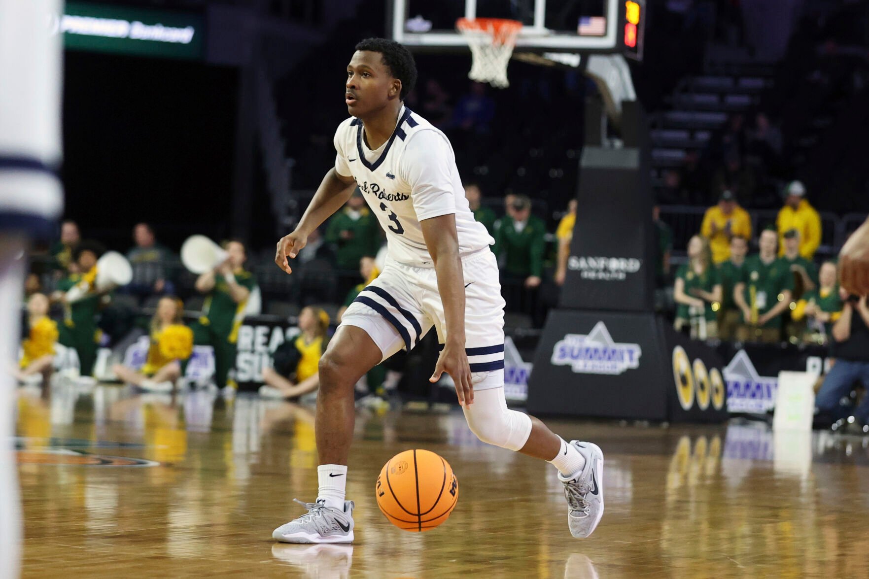 <p>Oral Roberts guard Max Abmas dribbles up the court against North Dakota State during the Summit League tournament championship game March 7.</p>