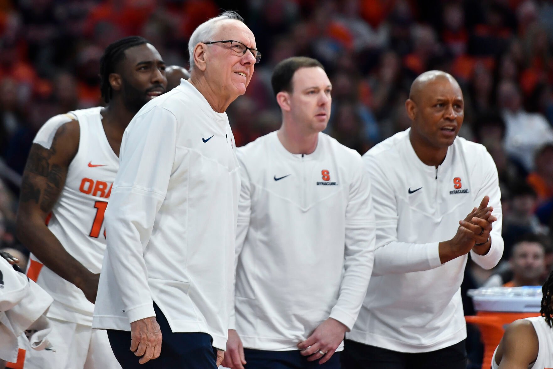 <p>Syracuse head coach Jim Boeheim, left, assistant coach Gerry McNamara, center, and associate head coach Adrian Autry watch from the bench during a game against Boston College on Dec. 31, 2022. </p>