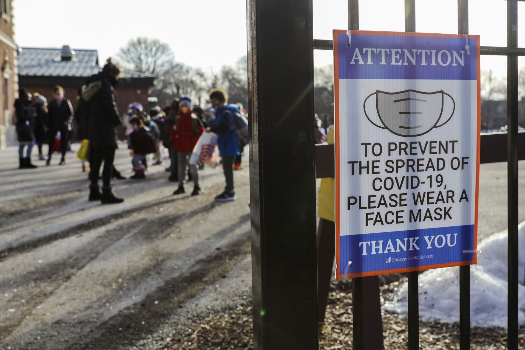 <p>Children from kindergarten to fifth grade arrive for in-person learning at Sutherland Elementary School on March 1, 2021, in Chicago.</p>