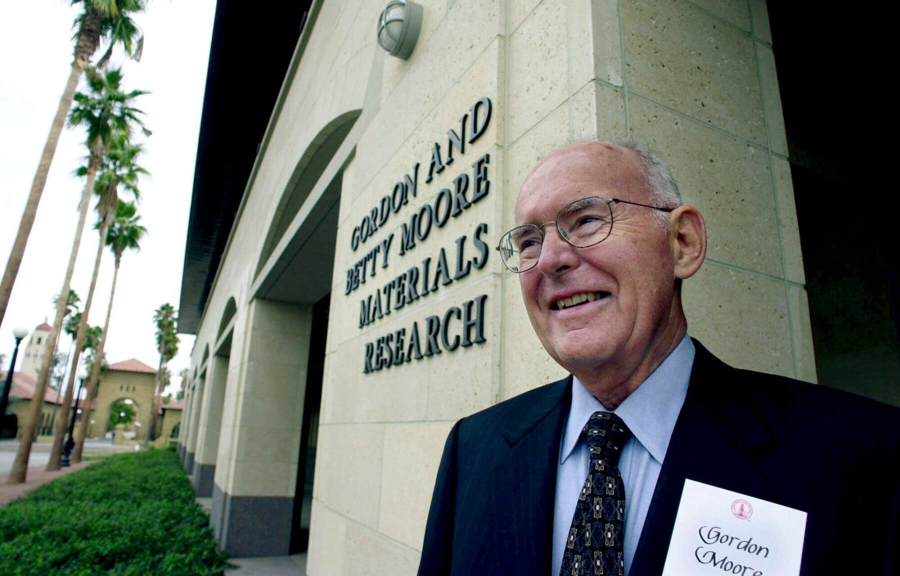 <p>FILE - Intel Corp. founder and chairman emeritus, Gordon Moore, smiles as he tours during the dedication of the new Gordon and Betty Moore Material Research building at Stanford University on the Stanford, Calif., campus, Wednesday, Oct. 11, 2000. Moore, the Intel Corp. co-founder who set the breakneck pace of progress in the digital age with a simple 1965 prediction of how quickly engineers would boost the capacity of computer chips, has died. He was 94. Intel and the Gordon and Betty Moore Foundation say Moore died Friday, March 24, 2023 at his home in Hawaii. (AP Photo/Paul Sakuma, File)</p>