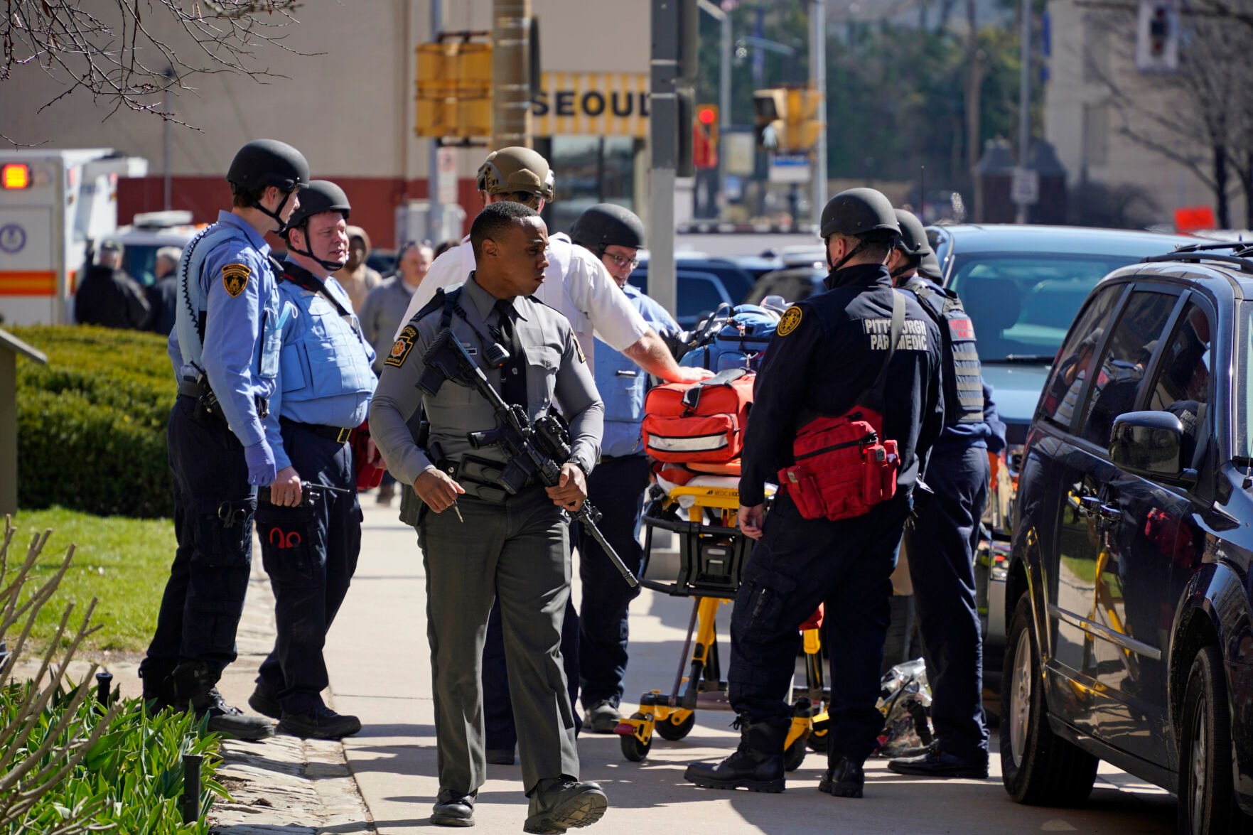 <p>Pittsburgh Police and paramedics respond to Pittsburgh Central Catholic High School for what turned out to be a hoax report of an active shooter, on Wednesday, March 29, 2023 in the Oakland neighborhood of Pittsburgh. (AP Photo/Gene J. Puskar)</p>