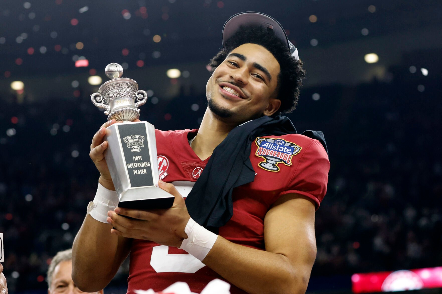 <p>Alabama quarterback Bryce Young holds the Most Outstanding Player trophy after Alabama defeated Kansas State 45-20 in the Sugar Bowl, Dec. 31, 2022, in New Orleans.</p>