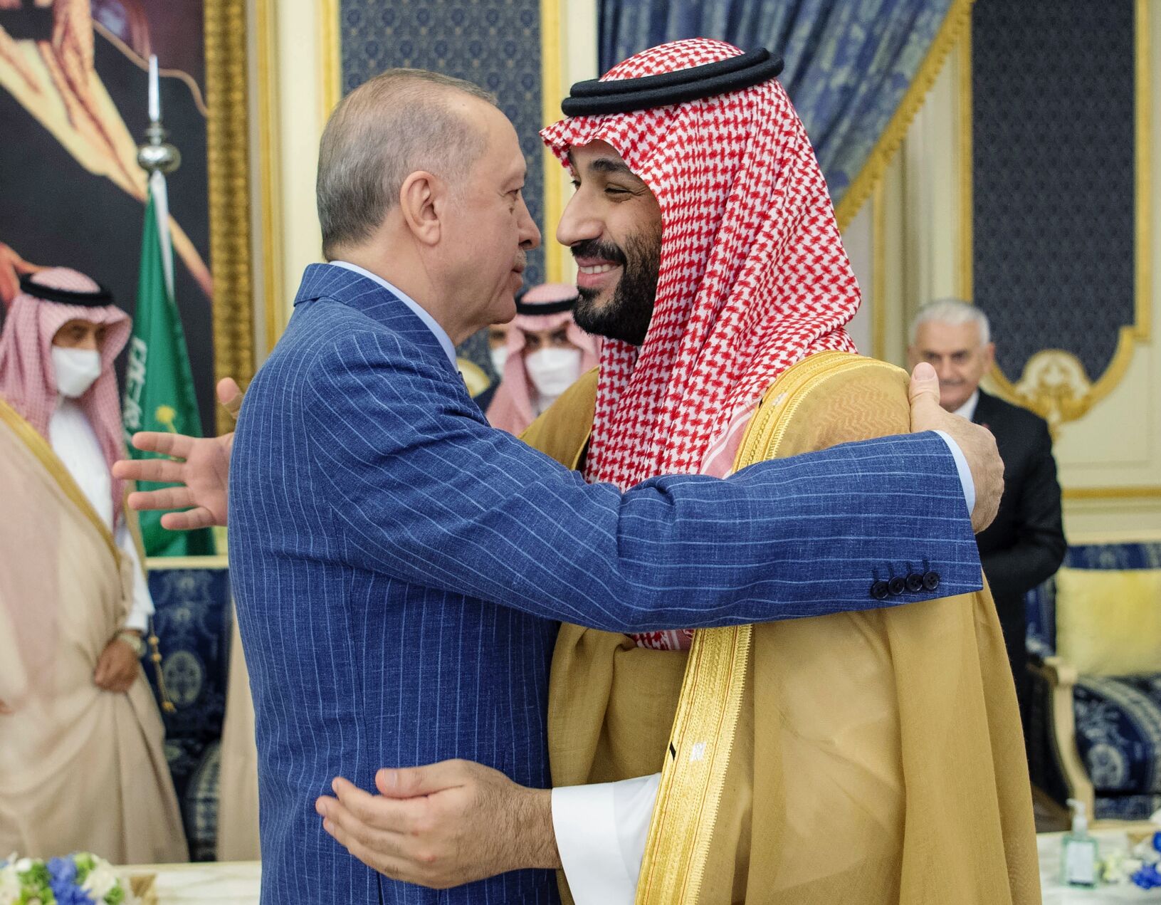 <p>Turkish President Recep Tayyip Erdogan, left, hugs Saudi Arabia's Crown Prince Mohammed bin Salman before a meeting April 28, 2022, in Jiddah, Saudi Arabia.</p>