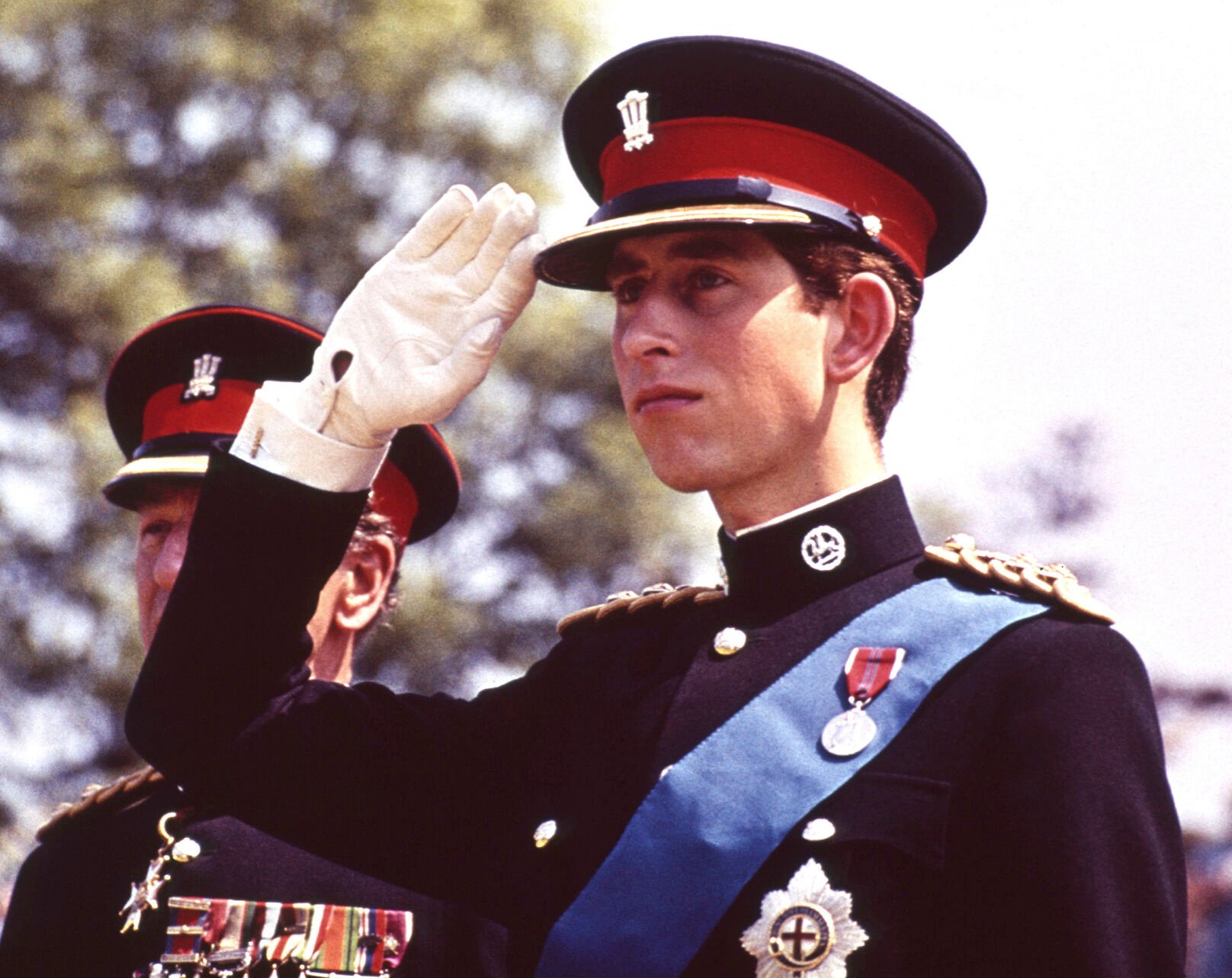 <p>Britain's Prince Charles, the Prince of Wales, salutes June 11, 1969, at the Regiment's Colour presentation at Cardiff Castle in Wales.</p>