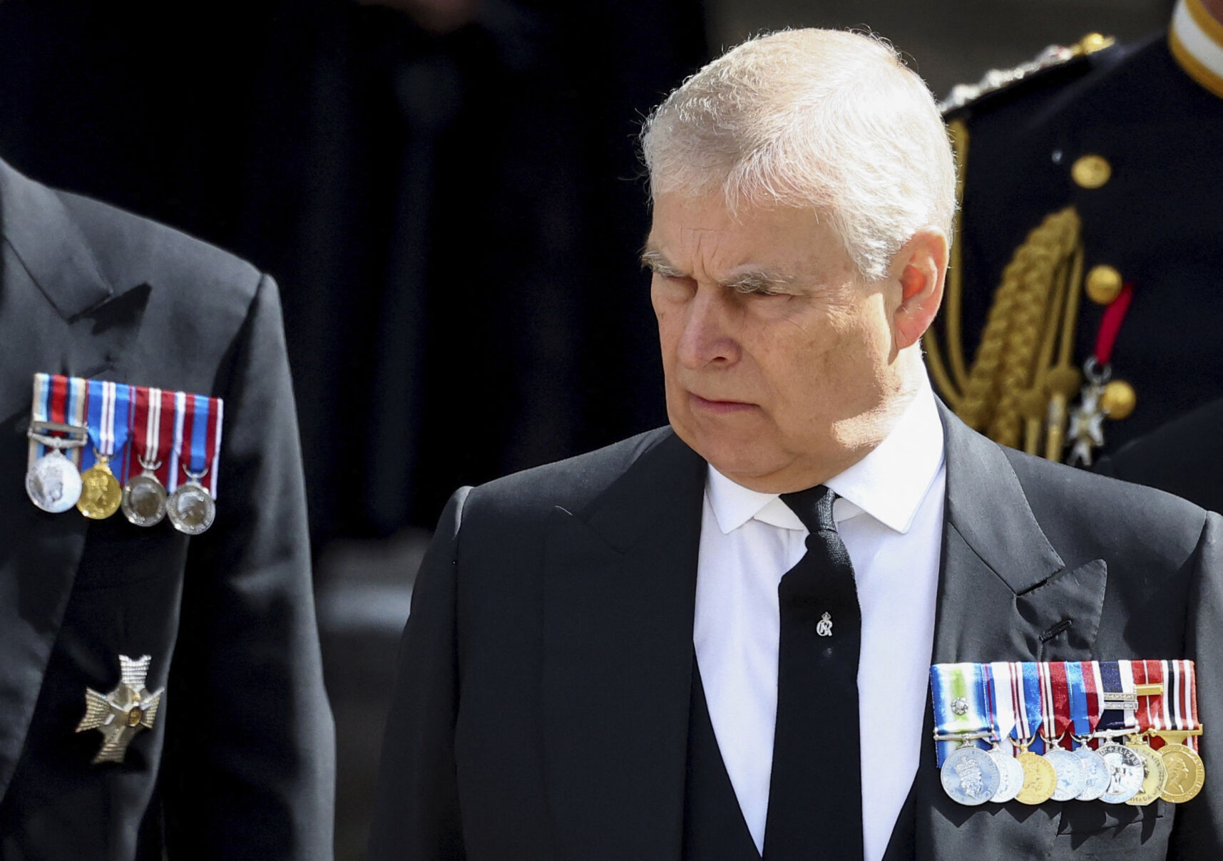 <p>FILE - Britain's Prince Andrew attends the state funeral and burial of Britain's Queen Elizabeth, in London, Monday Sept. 19, 2022. King Charles III will hope to keep a lid on those tensions when his royally blended family joins as many as 2,800 guests for the new king’s coronation on May 6 at Westminster Abbey. All except Meghan, the Duchess of Sussex, who won’t be attending.</p>