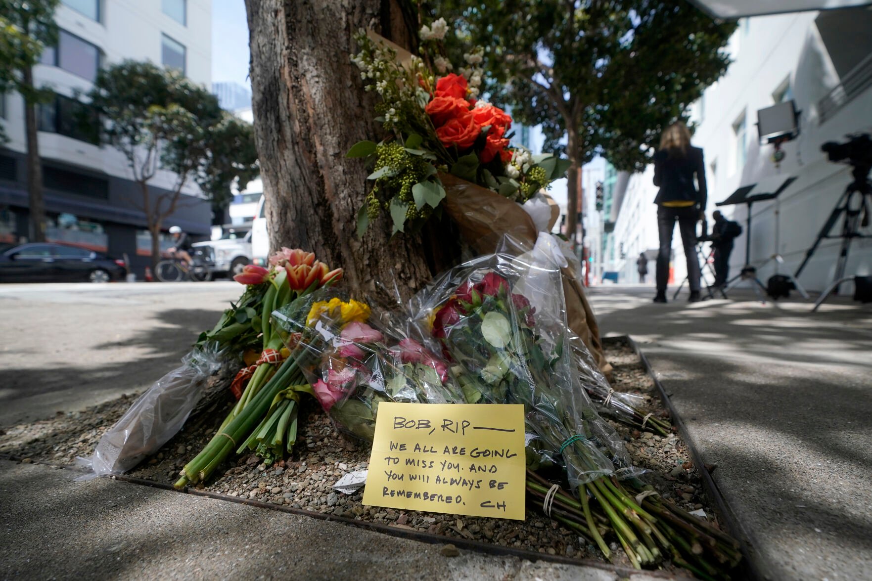 <p>Flowers sit at a tree in front of the building where a technology executive was fatally stabbed outside of in San Francisco, Thursday, April 6, 2023. Details of how tech executive Bob Lee came to be fatally stabbed in downtown San Francisco early Tuesday were scarce as friends and family continued to mourn the man they called brilliant, kind and unlike others in the industry. (AP Photo/Jeff Chiu)</p>