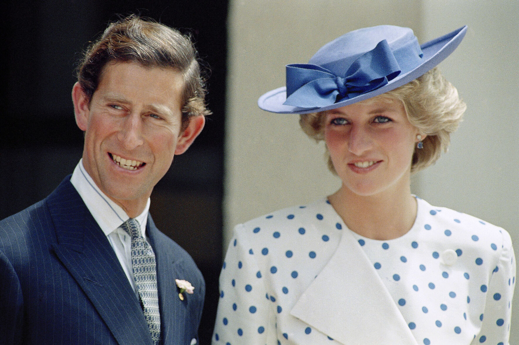 <p>FILE - Britain's Prince Charles with his wife Princess Diana in front of Lodge Canberra, Australia, Nov. 7, 1985. King Charles III will hope to keep a lid on those tensions when his royally blended family joins as many as 2,800 guests for the new king’s coronation on May 6 at Westminster Abbey. All except Meghan, the Duchess of Sussex, who won’t be attending.</p>
