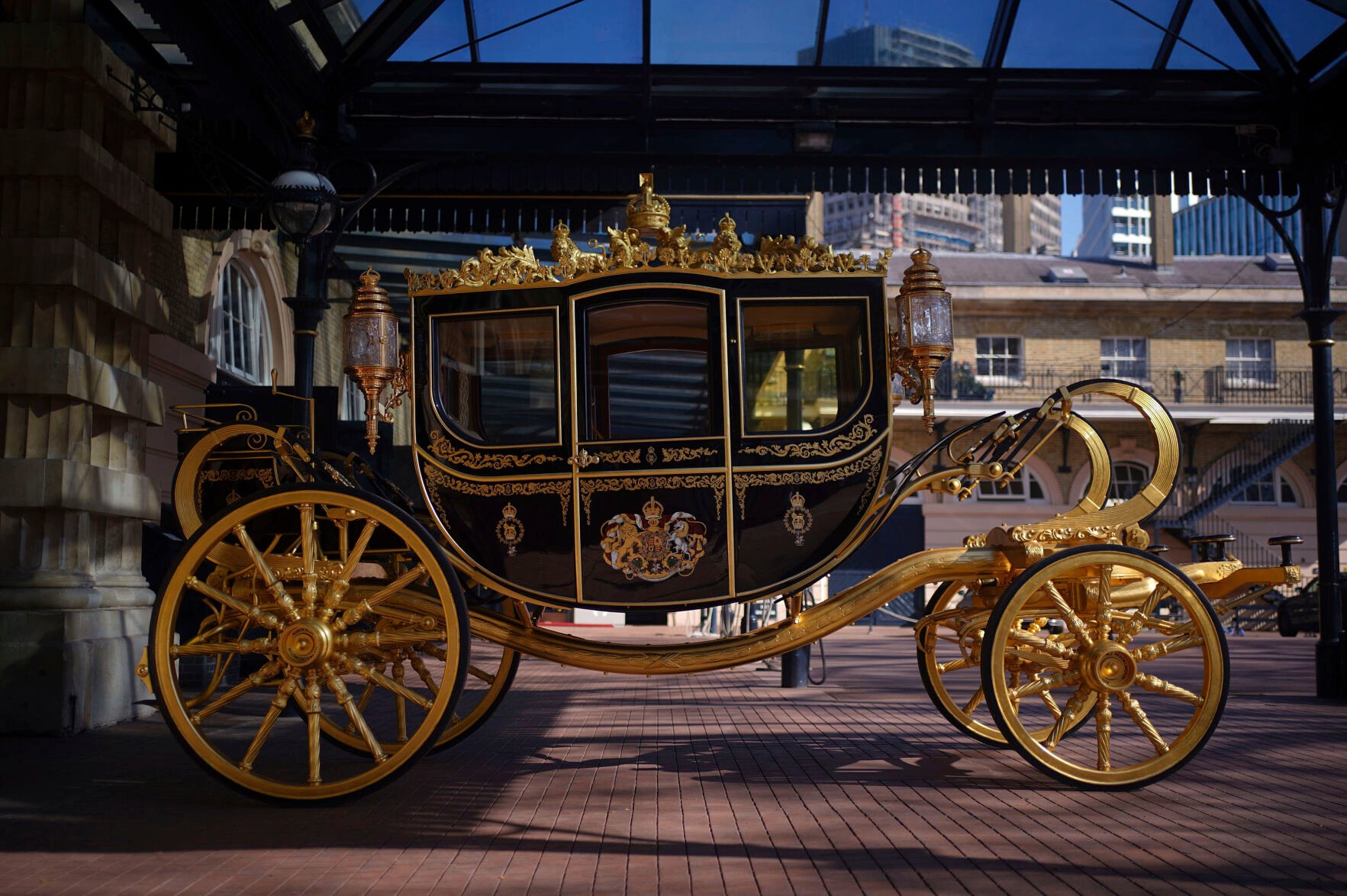 <p>King Charles III and the Queen Consort will travel to the coronation in the Diamond Jubilee State Coach, which is on display at the Royal Mews in Buckingham Palace, London. The king has trimmed the procession route his mother took in 1953 as he aims for a more modest coronation that will include some modern touches.</p>