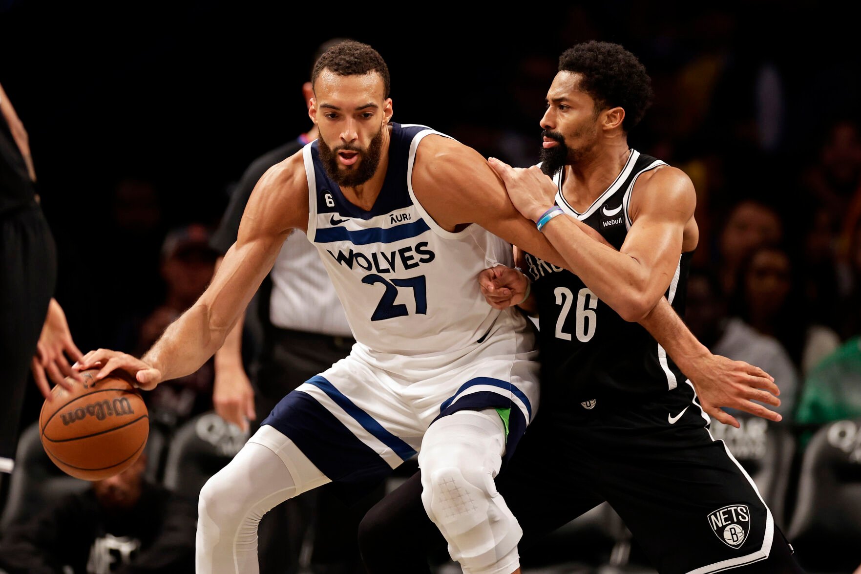 <p>Minnesota Timberwolves center Rudy Gobert, left, drives past Brooklyn Nets guard Spencer Dinwiddie during the second half of an April 4 game in New York.</p>