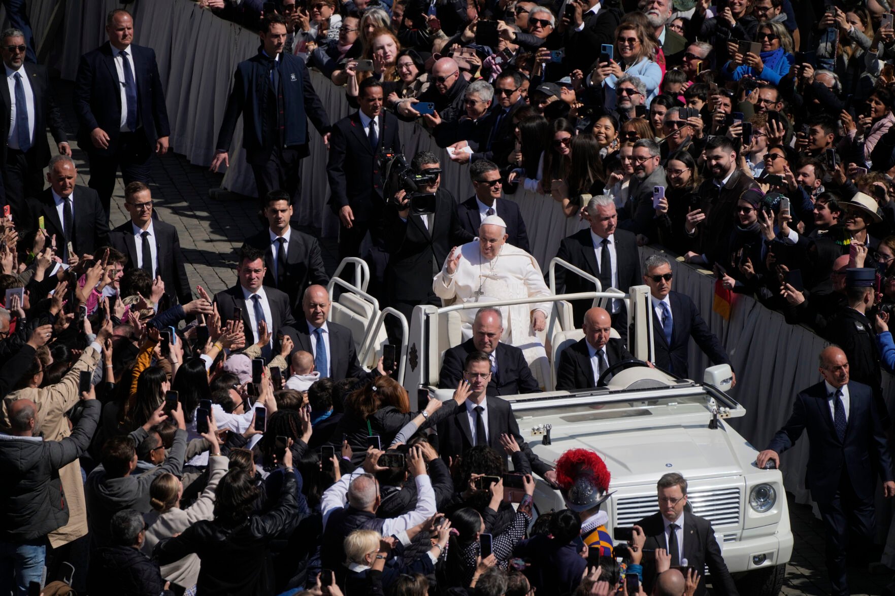<p>Pope Francis on the popemobile blesses the faithful in St. Peter's Square at The Vatican at the end of the Easter Sunday mass, Sunday, April 9, 2023. (AP Photo/Gregorio Borgia)</p>