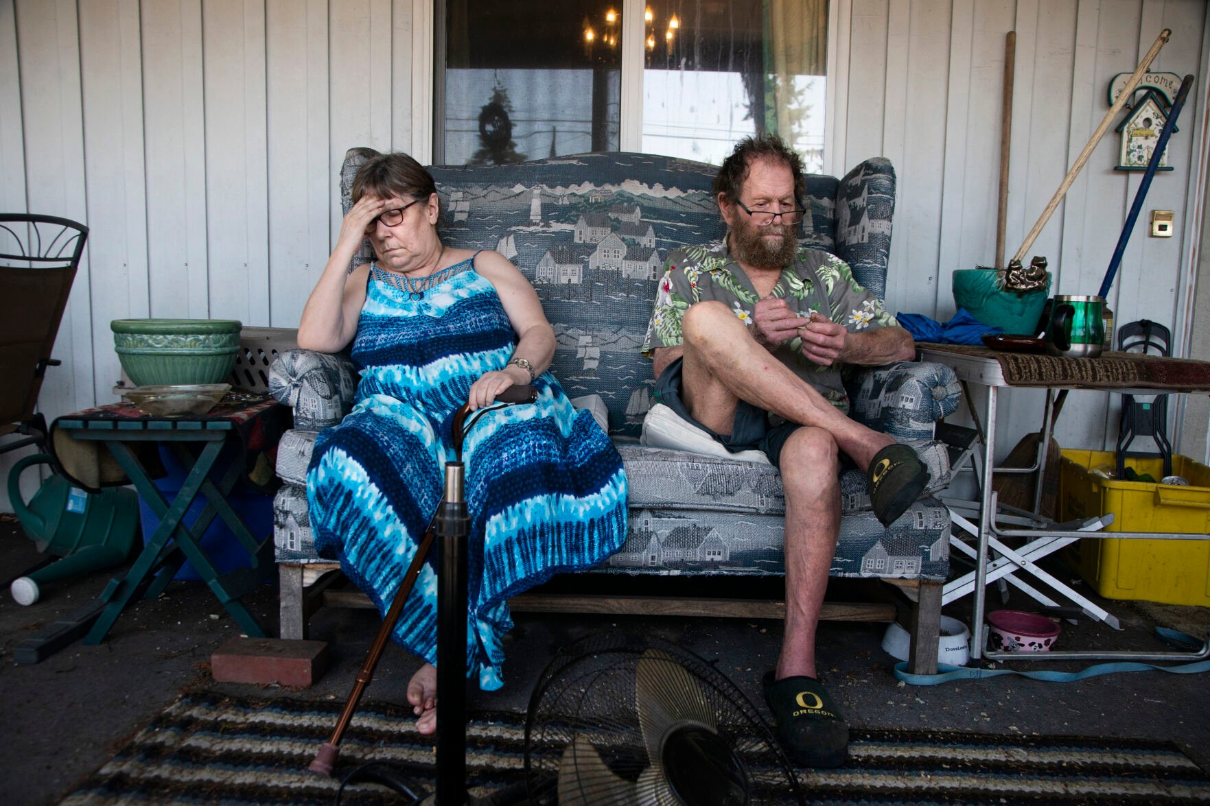<p>Judy, left, and Merlyn Webber sit out in front of their home at Mobile Estates on Southeast Division Street in Portland, Ore., Tuesday, July 26, 2022. As heat waves fueled by climate change arrive earlier, grow more intense and last longer, people over 60 who are more vulnerable to high temperatures are increasingly at risk of dying from heat-related causes.</p>