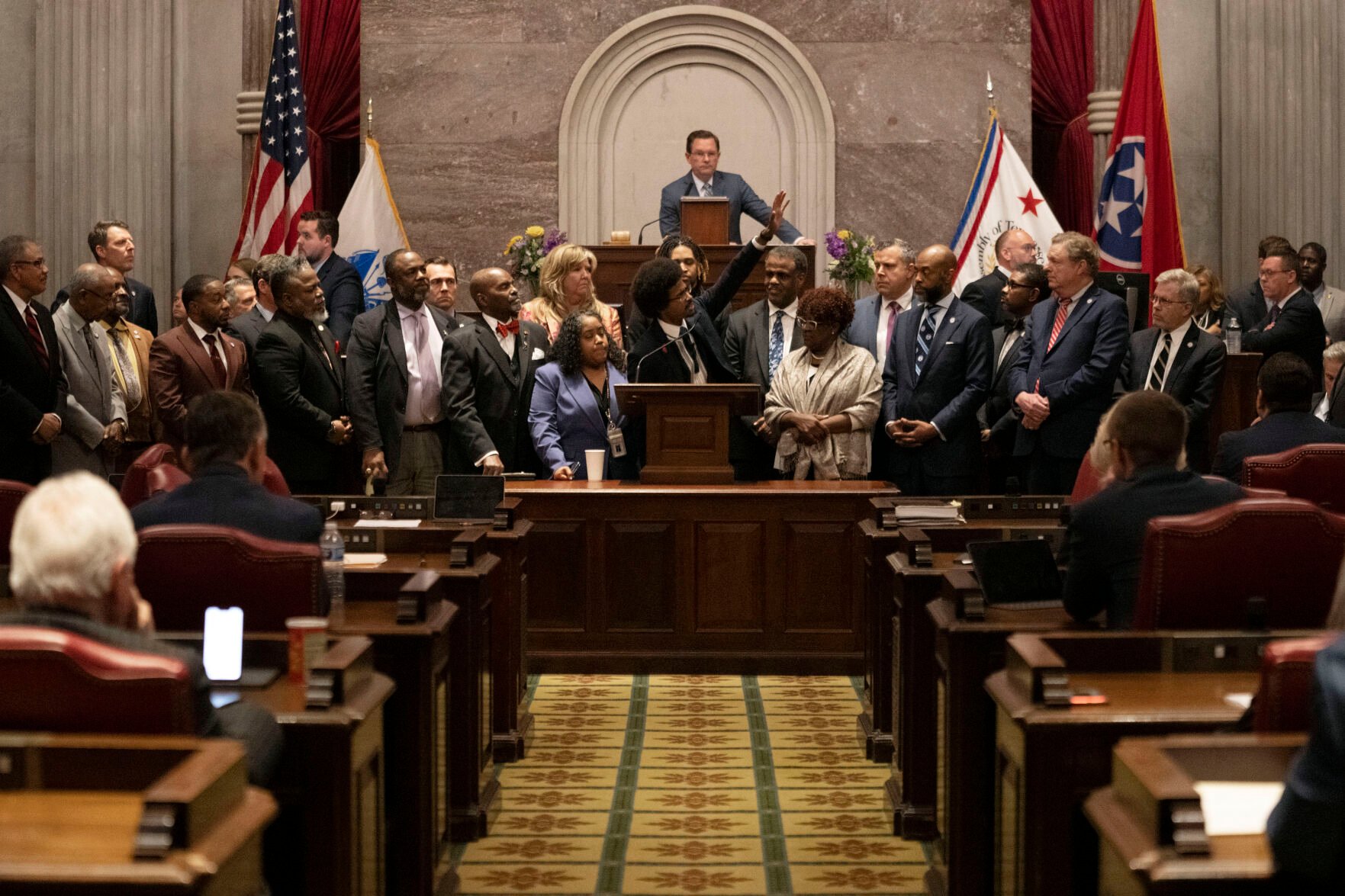 <p>Former Rep. Justin Pearson, D-Memphis, waves to his supporters in the gallery as he delivers his final remarks on the floor of the House chamber as he is expelled from the legislature Thursday, April 6, 2023, in Nashville, Tenn. Tennessee Republicans ousted two of three House Democrats for using a bullhorn to shout support for pro-gun control protesters in the House chamber. (AP Photo/George Walker IV)</p>
