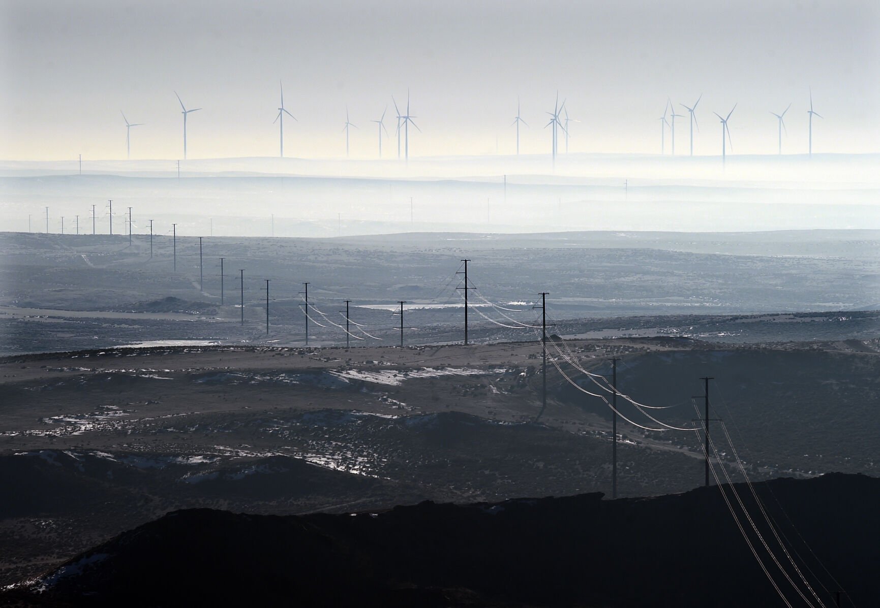 <p>Power lines run from the Clearwater wind project near Circle, Montana. The wind farm has a capacity of 750 megawatts.</p>
