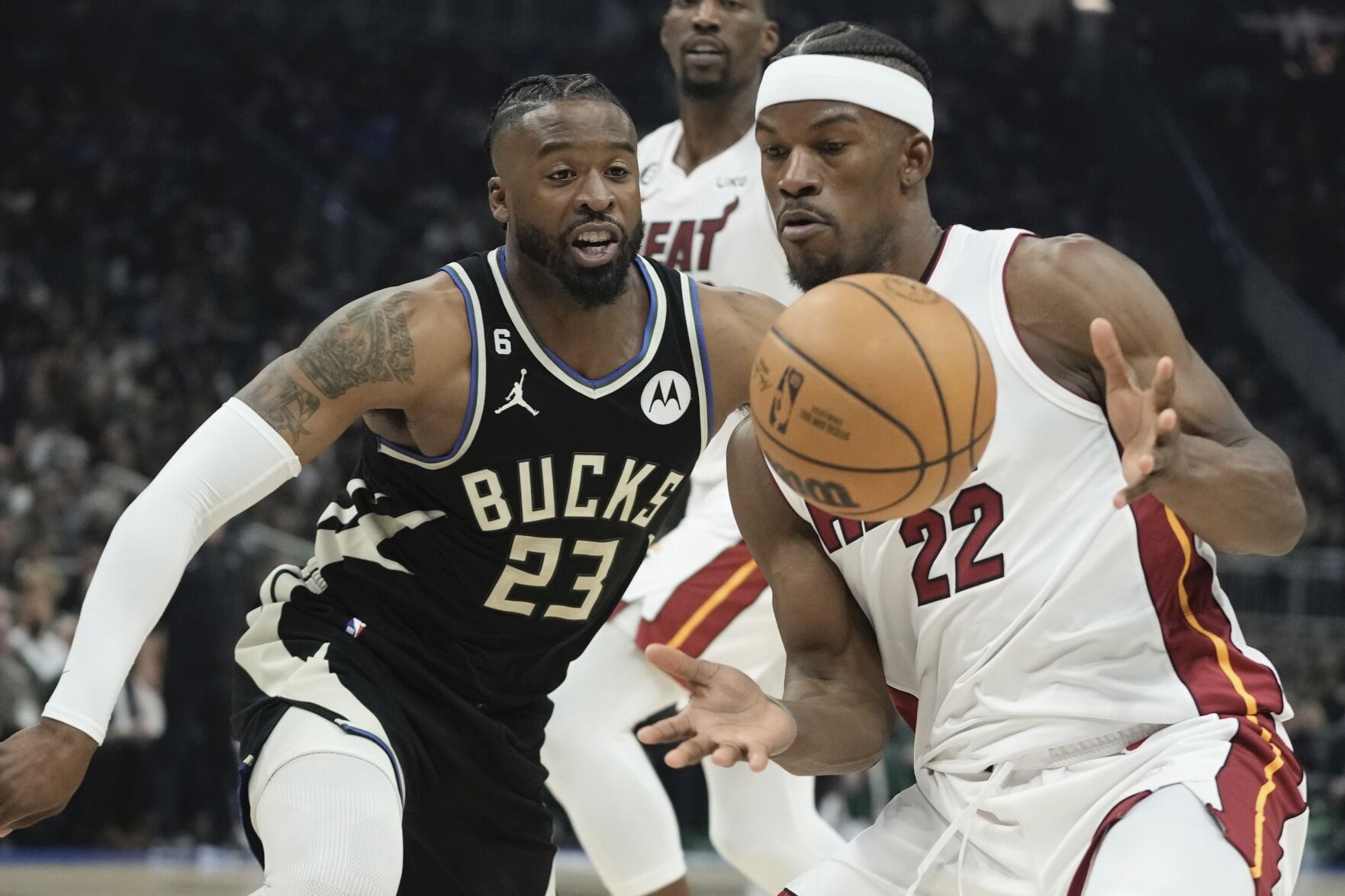 <p>Milwaukee Bucks' Wesley Matthews knocks the ball from Miami Heat's Jimmy Butler during the first half Sunday's Game 1 of an NBA first-round playoff series in Milwaukee.</p>