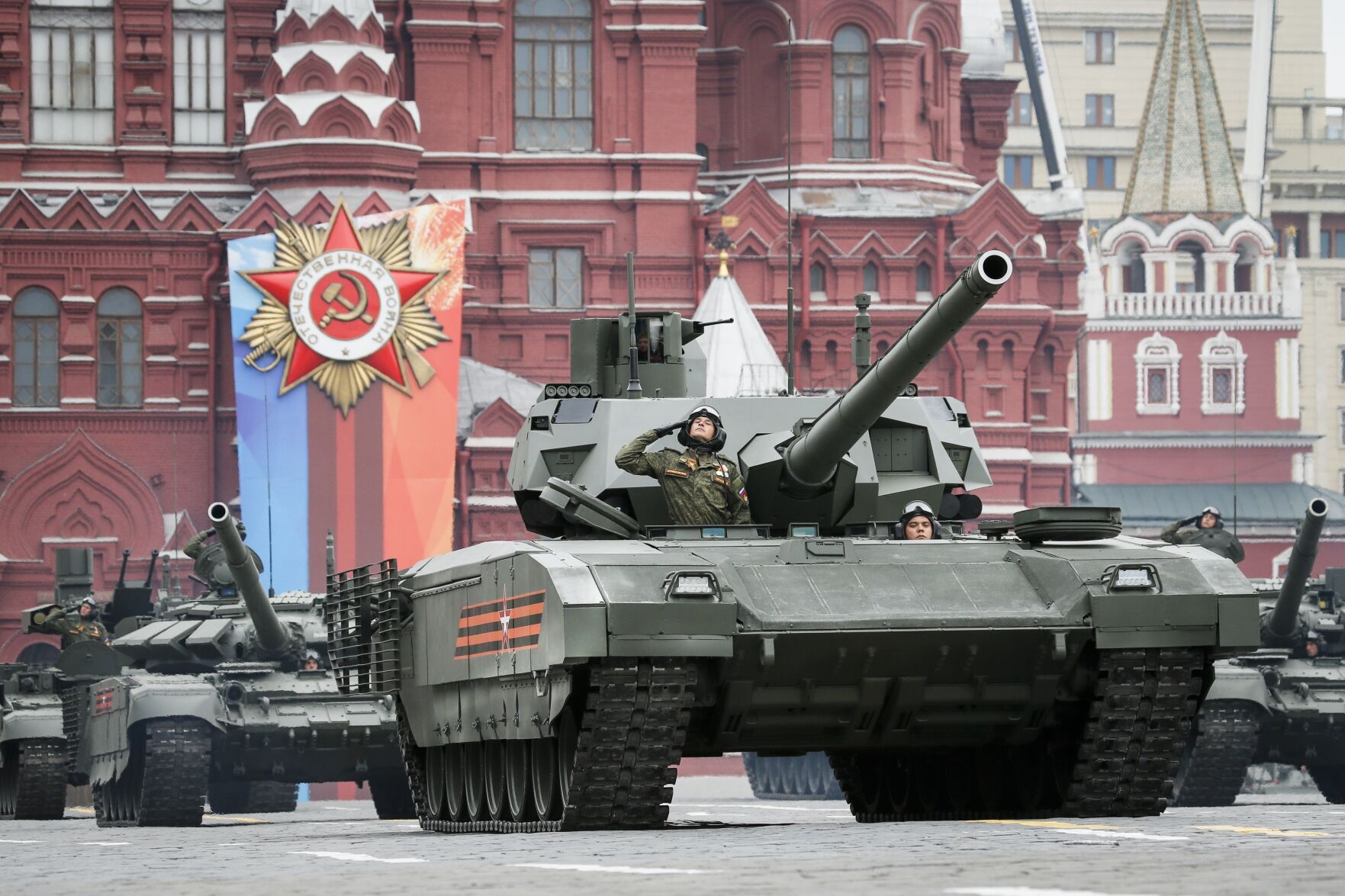 <p>FILE - A Russian Armata tank, foreground rolls along Red Square during a rehearsal for the Victory Day military parade in Moscow, Russia, Sunday, May 6, 2018. An independent Sweden-based watchdog says the world military spending has grown for the eighth consecutive year in 2022 to an all-time high of 40 billion leading to a sharp rise of 13% taking place in Europe, chiefly due to Russian and Ukrainian expenditure. (AP Photo/Alexander Zemlianichenko, File)</p>