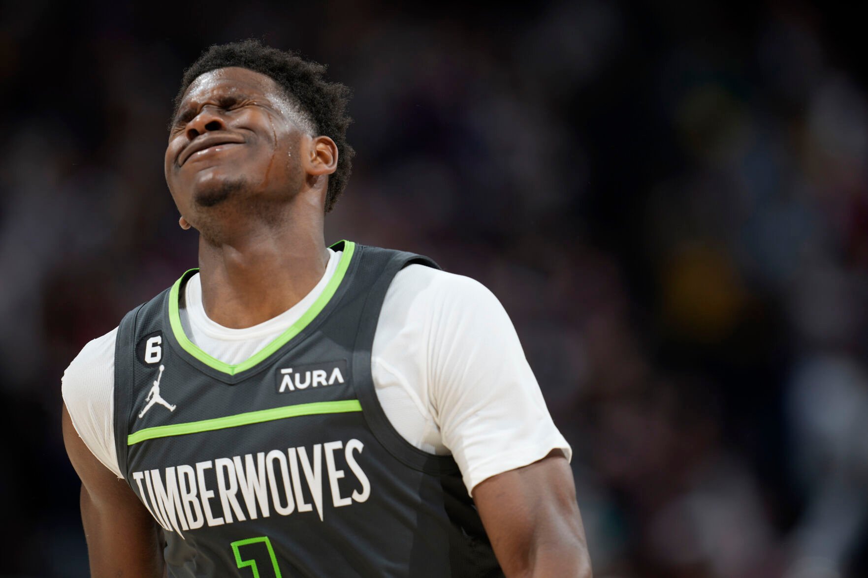 <p>Timberwolves guard Anthony Edwards reacts after missing a last-second, 3-point shot for a chance to tie the Nuggets in Tuesday's first-round playoff game in Denver.</p>