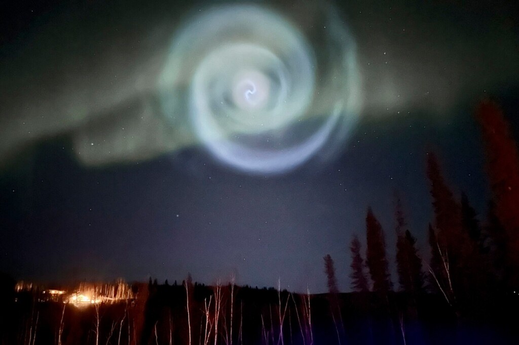 Odd Spiral Appears Amid Northern Lights In Alaska Night Sky