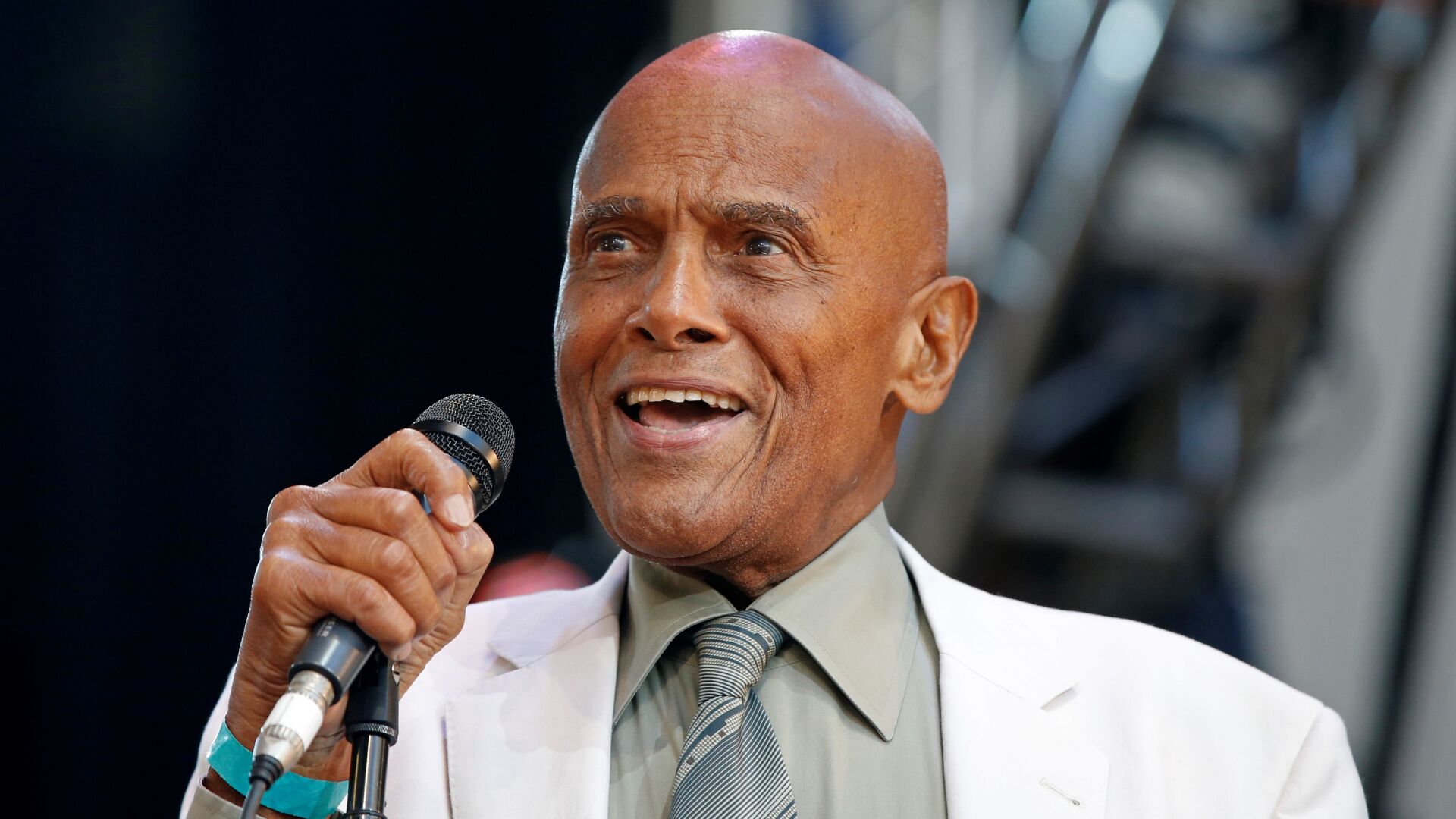 <p>In this July 20, 2014 file photo, singer and activist Harry Belafonte speaks during a memorial tribute concert for folk icon and civil rights activist Pete Seeger at Lincoln Center's Damrosch Park in New York. </p>