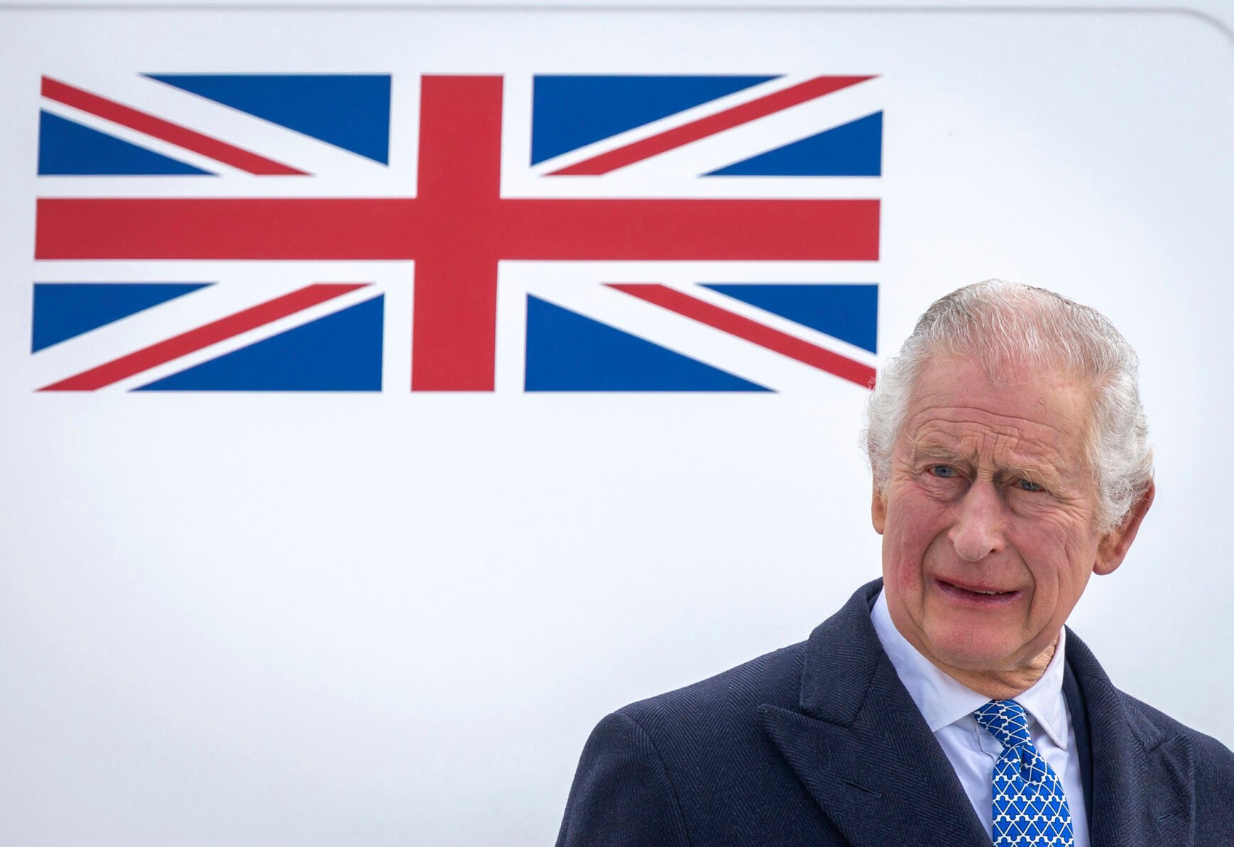 <p>Britain's King Charles III stands in front of the plane March 29 after arriving at Berlin Airport in Berlin, Germany.</p>