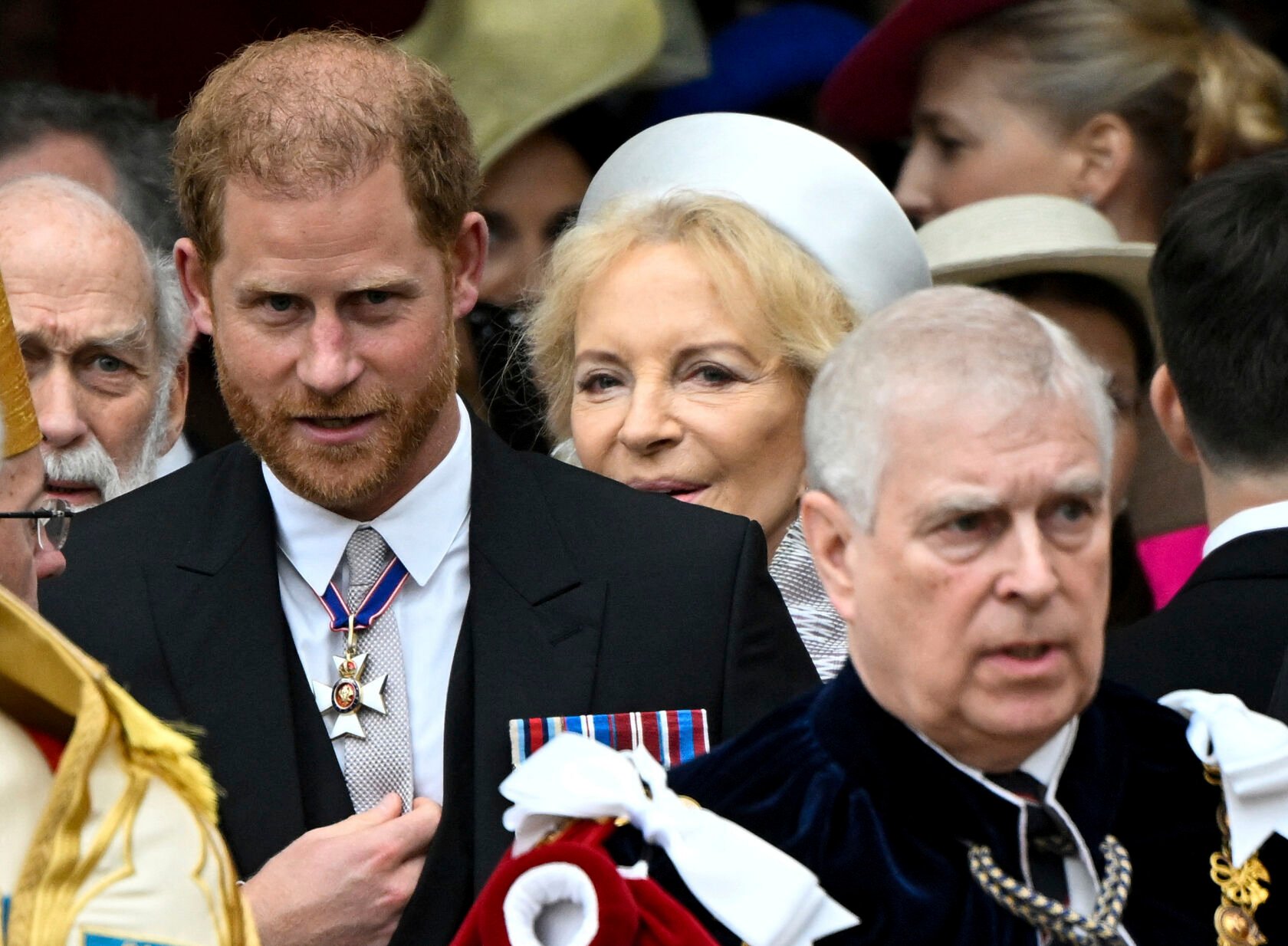 <p>Prince Harry, Duke of Sussex, and Prince Andrew leave Westminster Abbey after the coronation ceremony of King Charles and Queen Camilla on Saturday in London.</p>