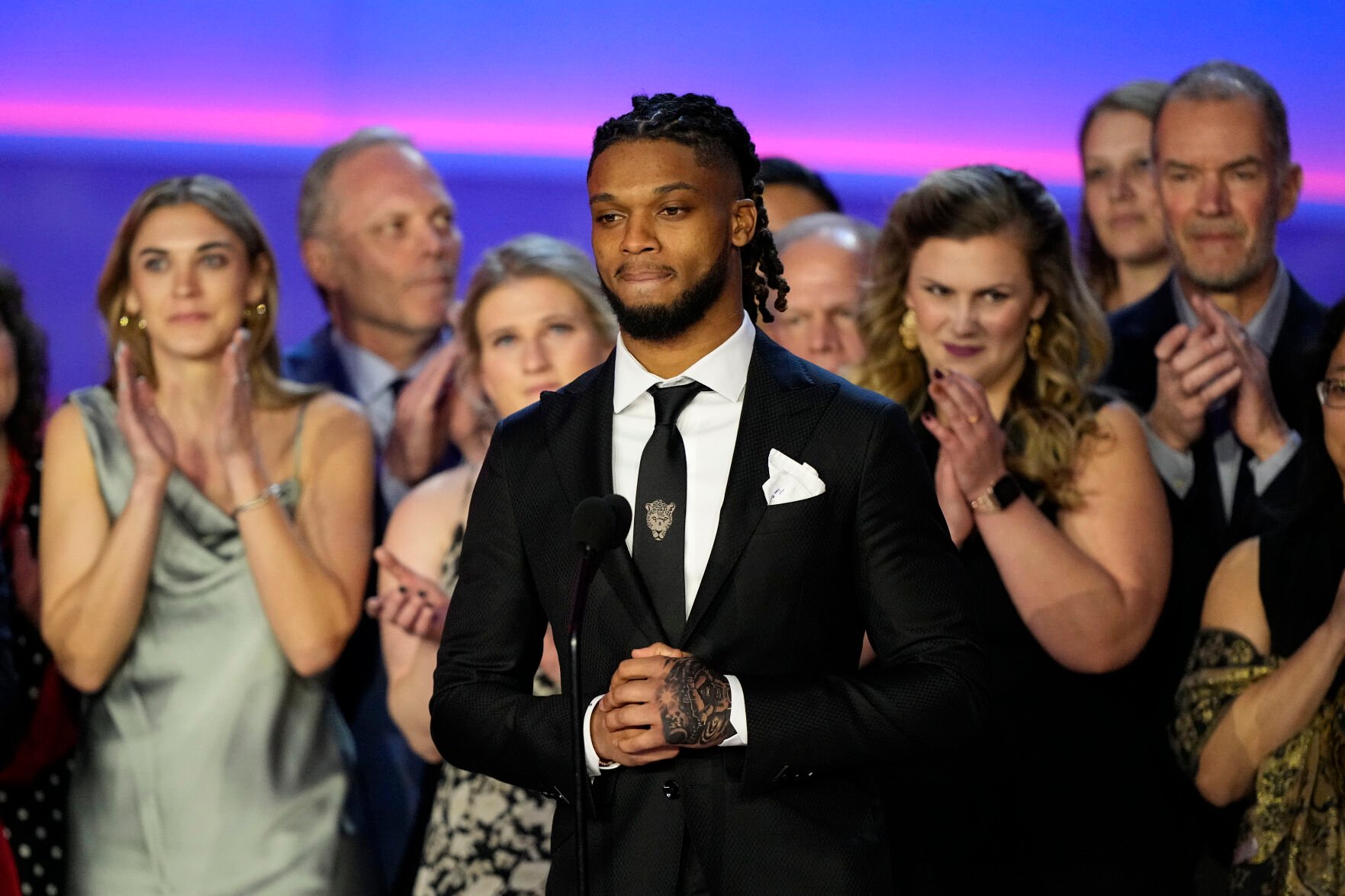 <p>The Buffalo Bills' Damar Hamlin speaks in front of University of Cincinnati Medical Center staff during the NFL Honors award show on Feb. 9 ahead of Super Bowl 57.</p>