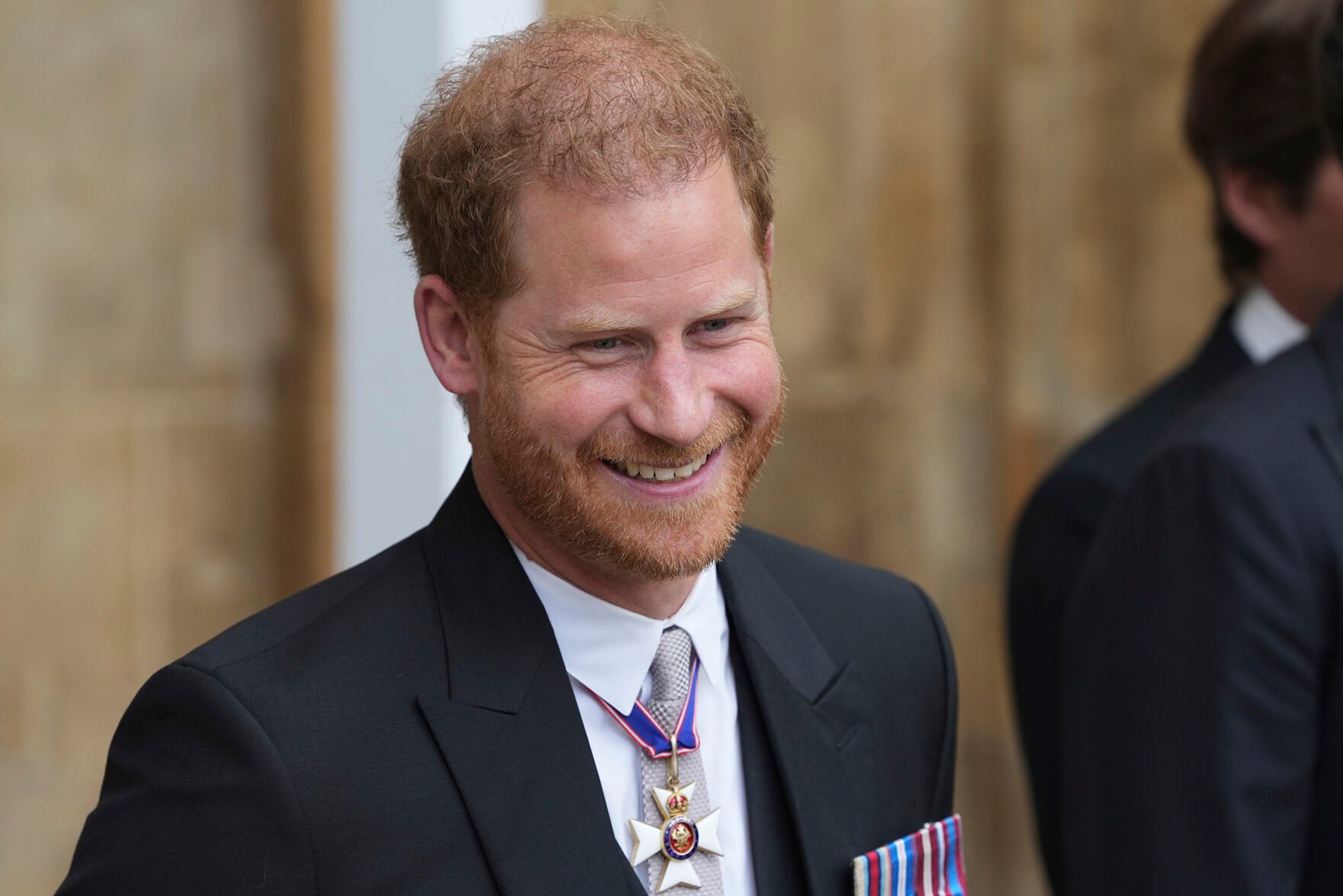 <p>Prince Harry leaves Westminster Abbey Saturday after the Coronation of King Charles III in London.</p>