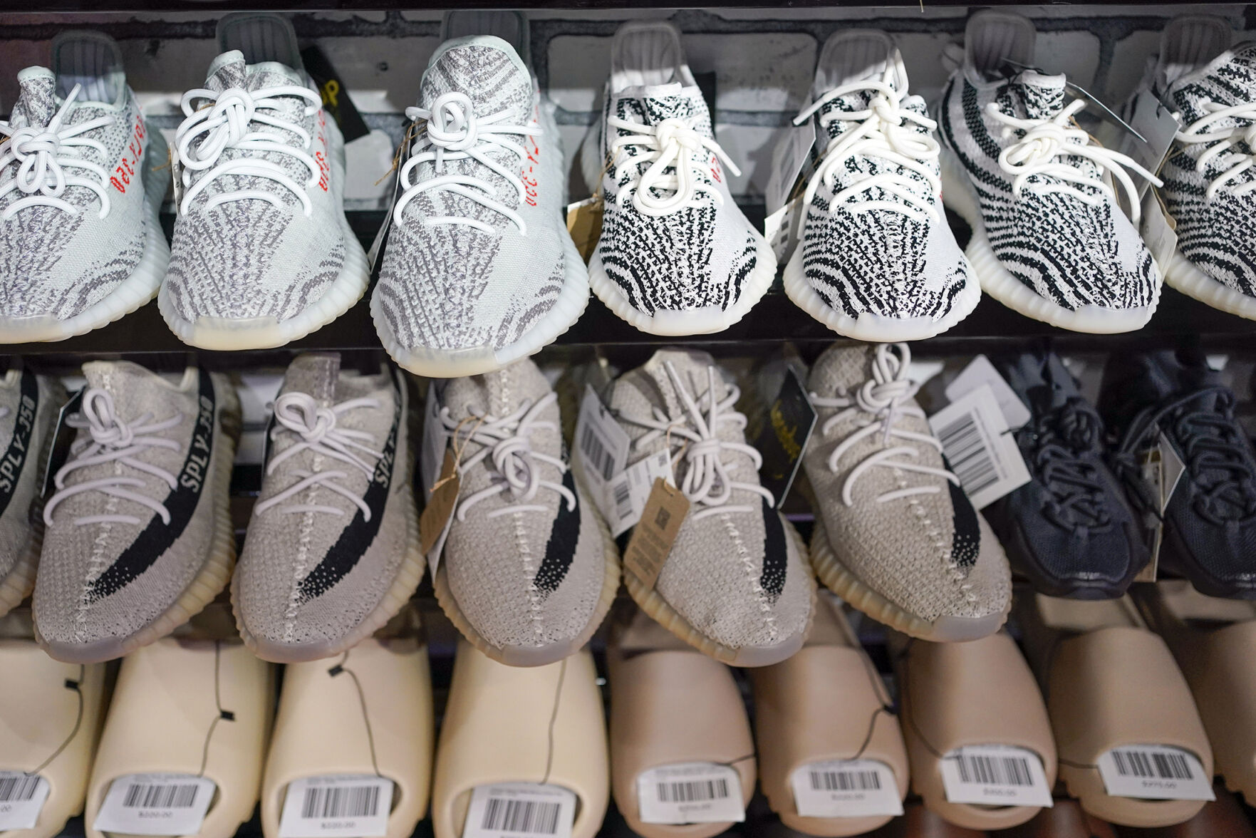 <p>Yeezy shoes made by Adidas are displayed Oct. 25 at Laced Up, a sneaker resale store, in Paramus, N.J.</p>